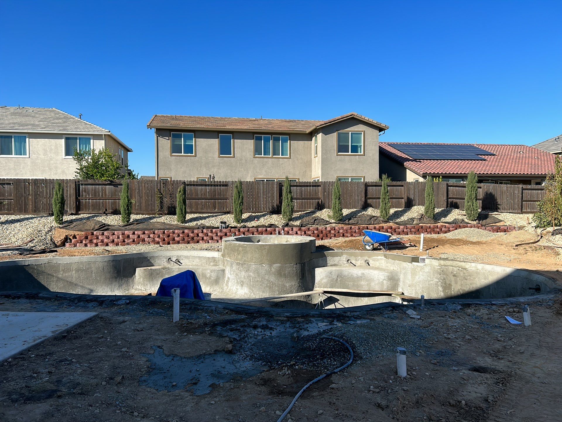 New Pool and Spa with Iridescent Blue Tile in Roseville by Dolphin Pools and Spas
