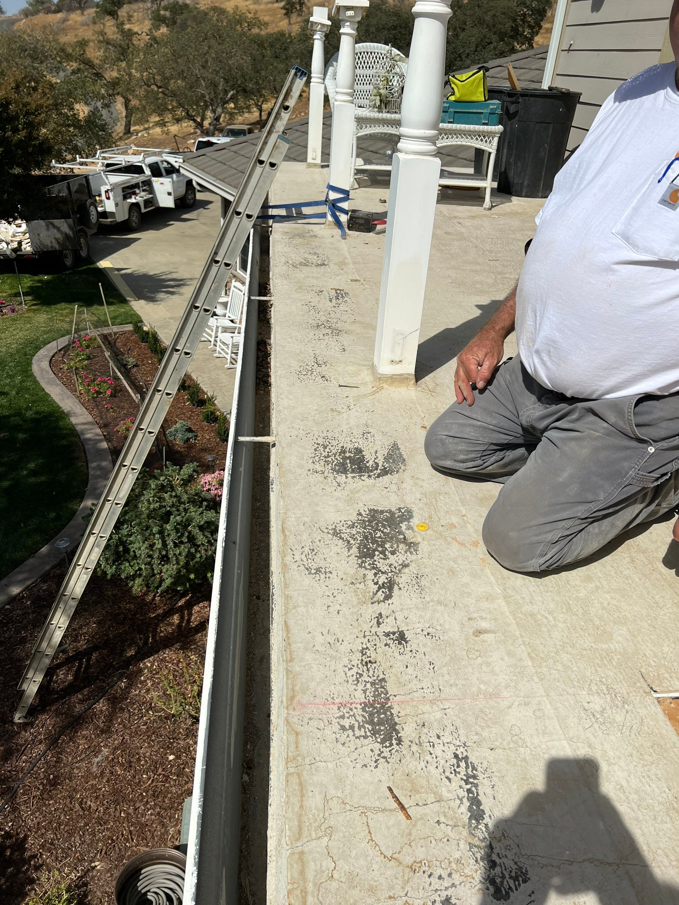 Sealant system over walk deck over house using Rubber coat and coatings by Straight Edge Roofing Inc