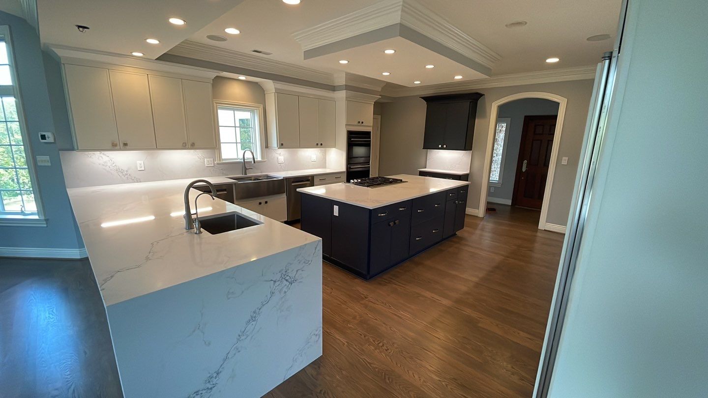 Kitchen Remodel using Fabuwood Luna Dove and Indigo Cabinetry by HomeWerkes Design & Build