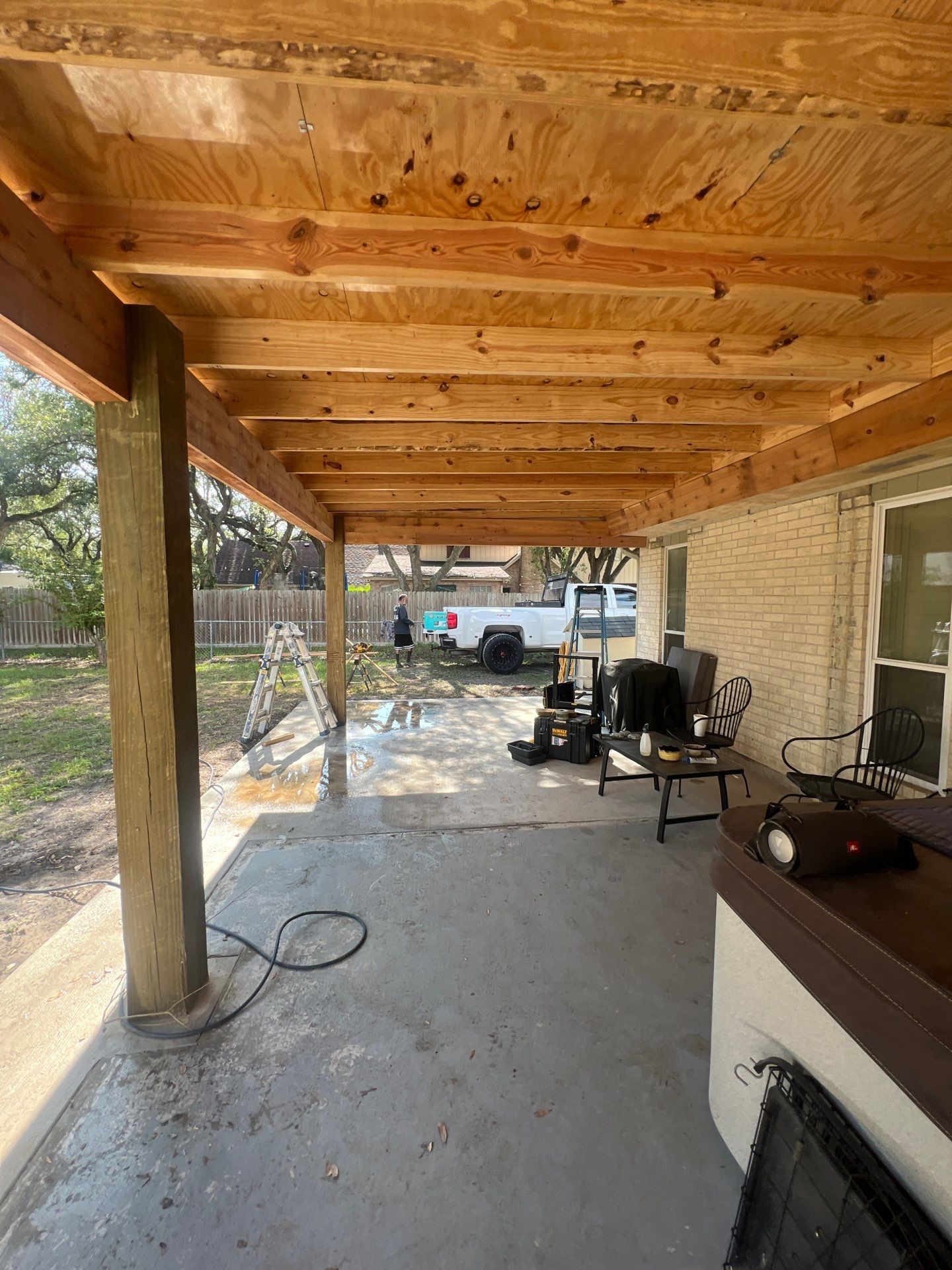 Hot Tub Time Machine  by Bayfront Roofing and Construction