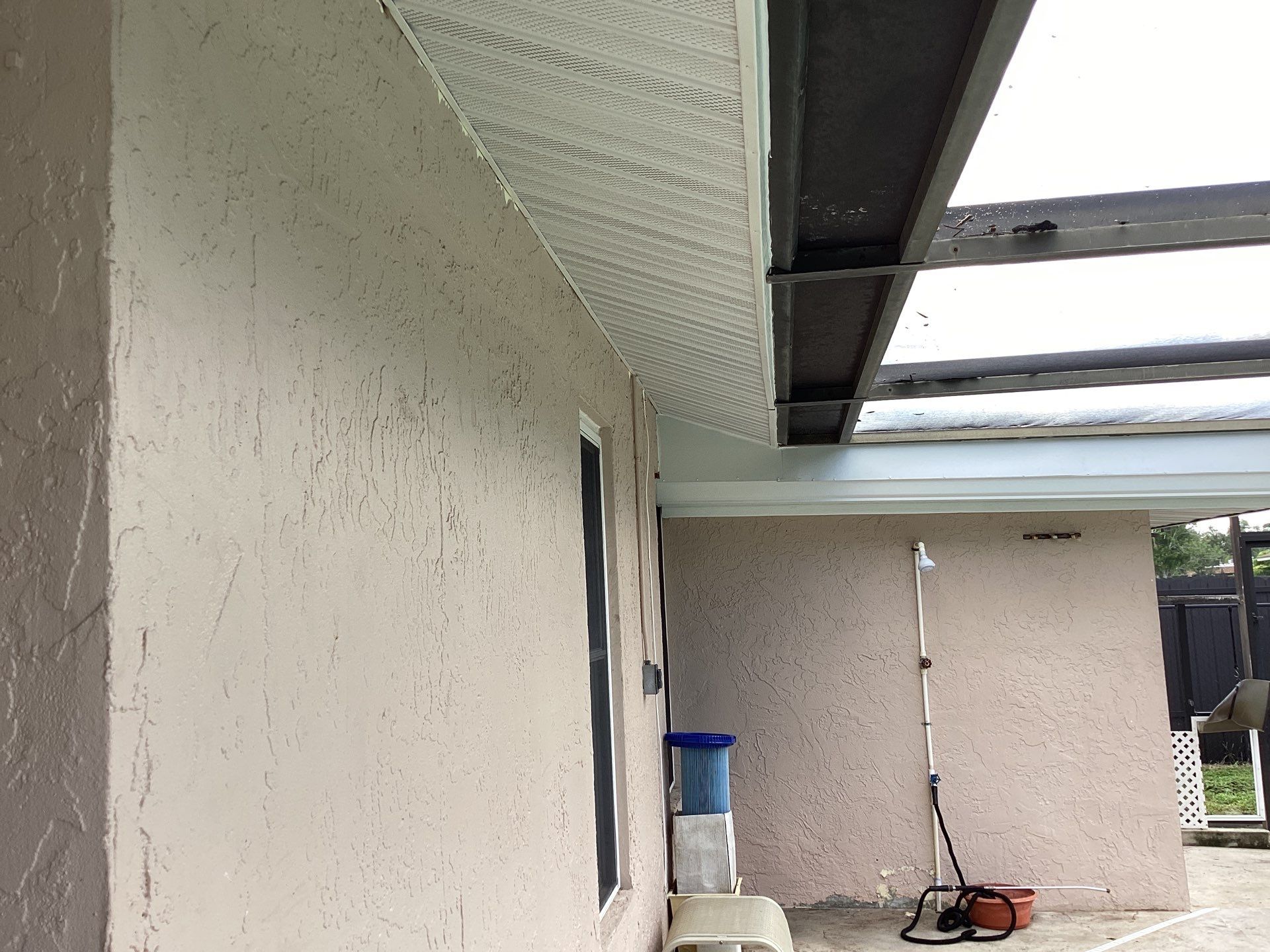 White Seamless Gutters and Splash Guards in Fort Myers FL by Gutter Professor by Gutter Professors