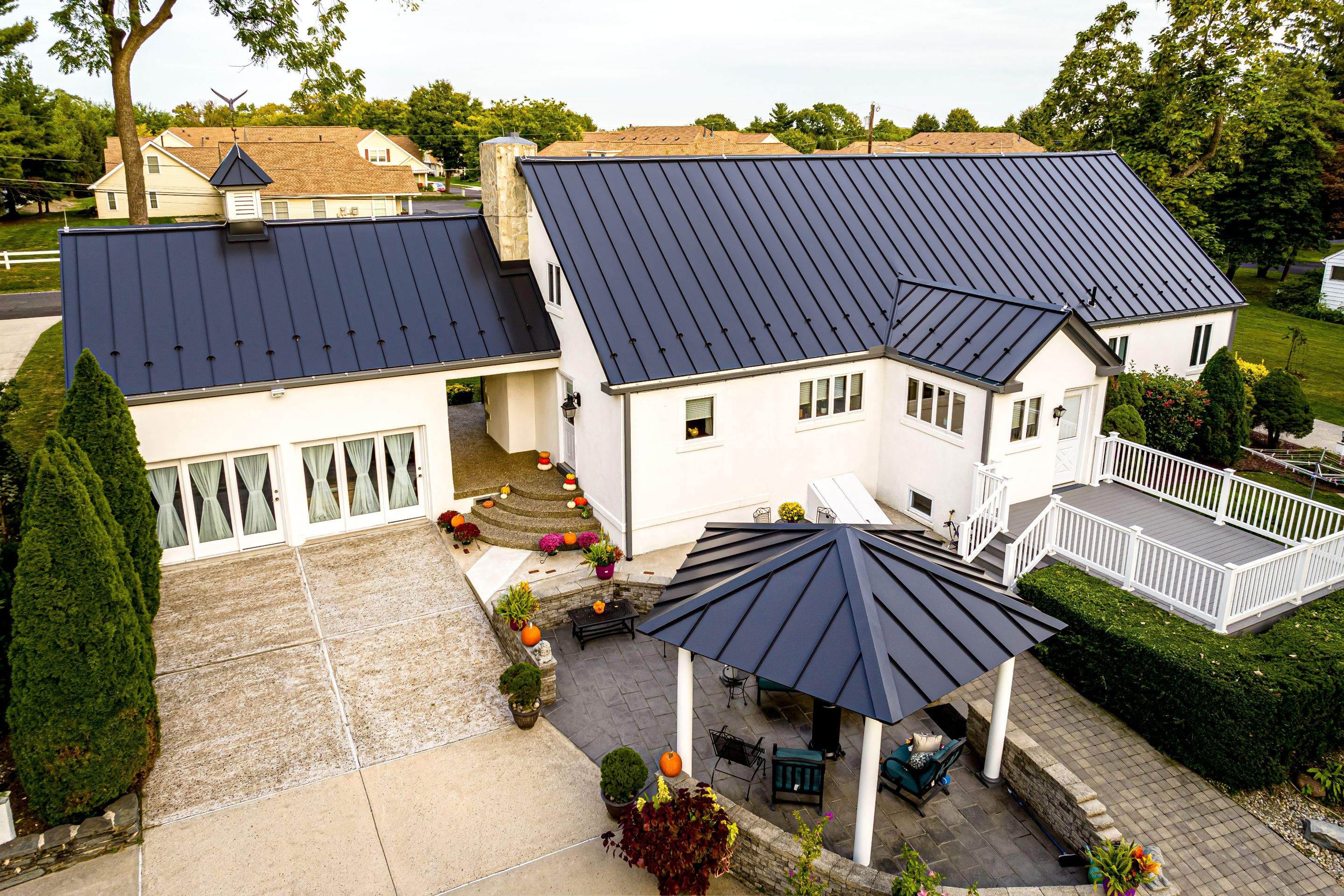 Standing Seam Metal roof-black by Esh Builders