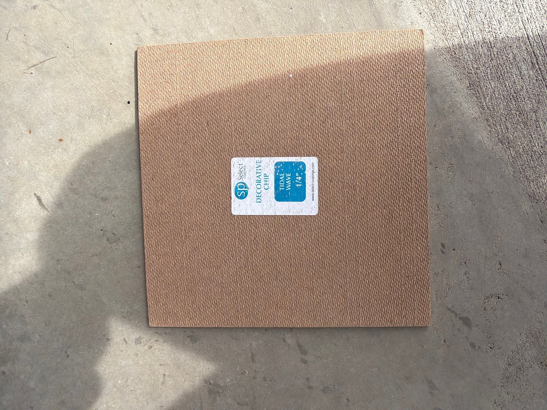 Custom Epoxy Garage Floor Coating Installation in Sioux Falls by Select Painting, Coatings & Garage Cabinets