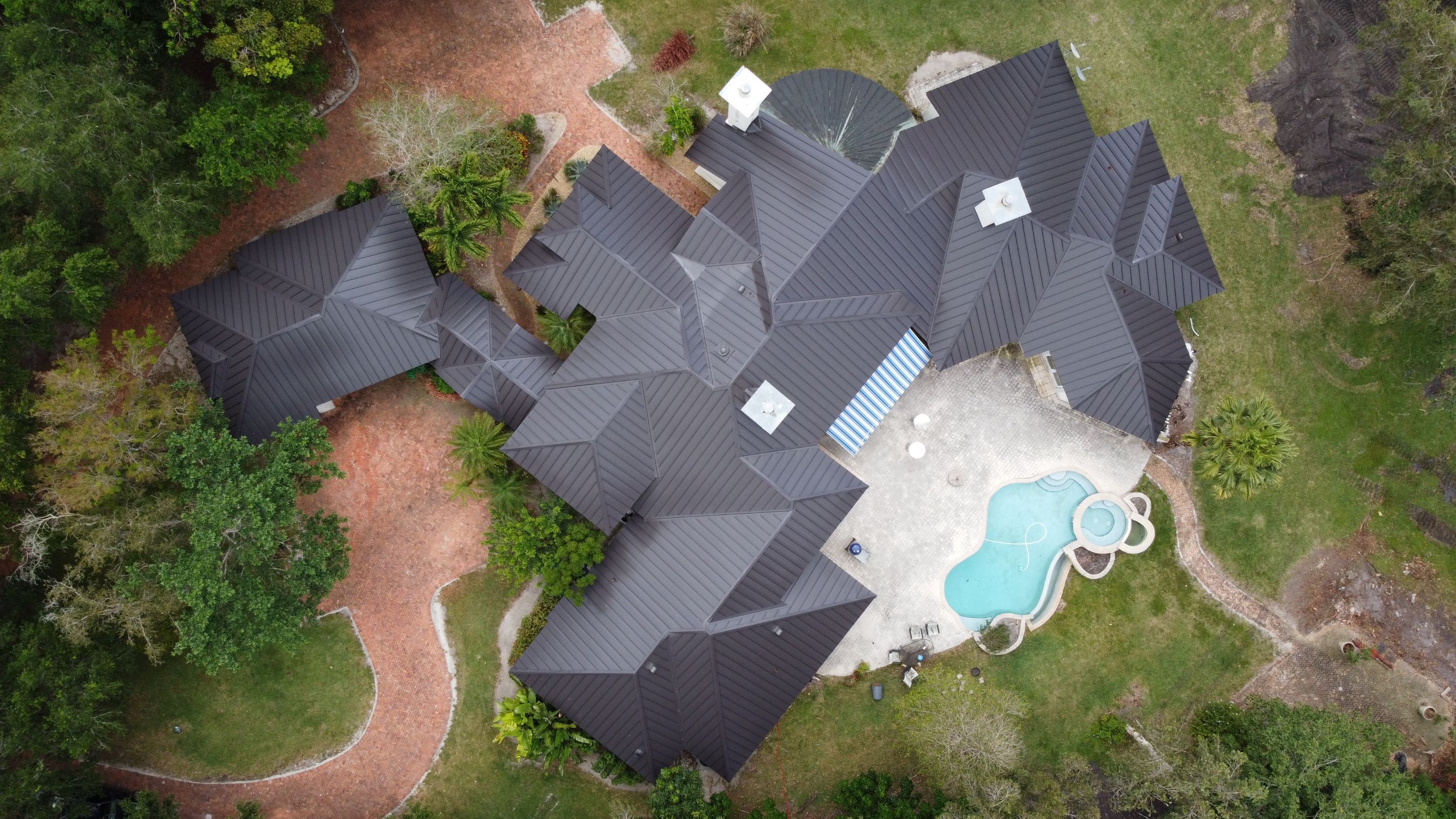 Residential Roofing Installation using 1" Nail strip metal roof by BLUES BROTHERS ROOFING