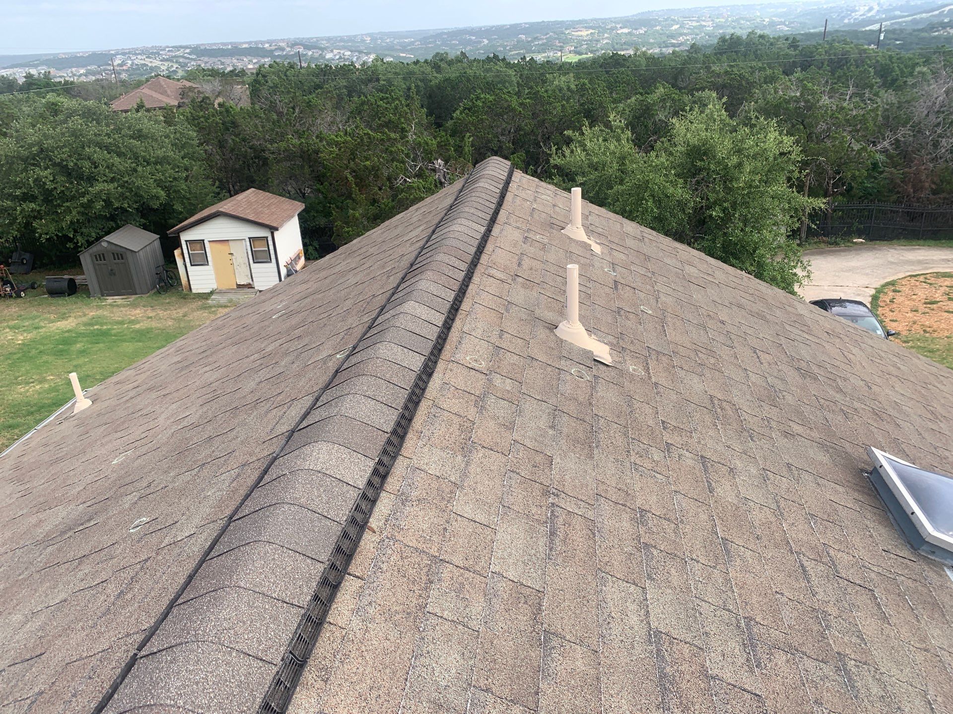 Leander Hail Damage Restoration and Architectural Shingle Roof Replacement by Caliber Restoration LLC