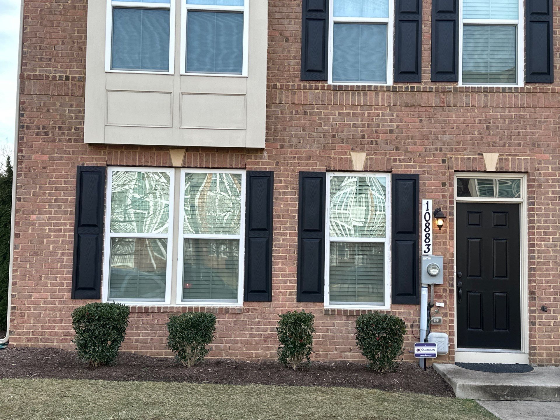 Black Shutters using Mid America Raised Panel by ExteriorPros