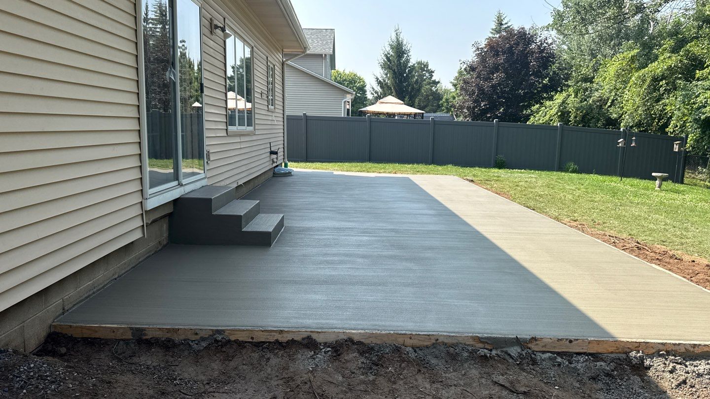 Broom Finished Patio  by NG Masonry & Construction LLC