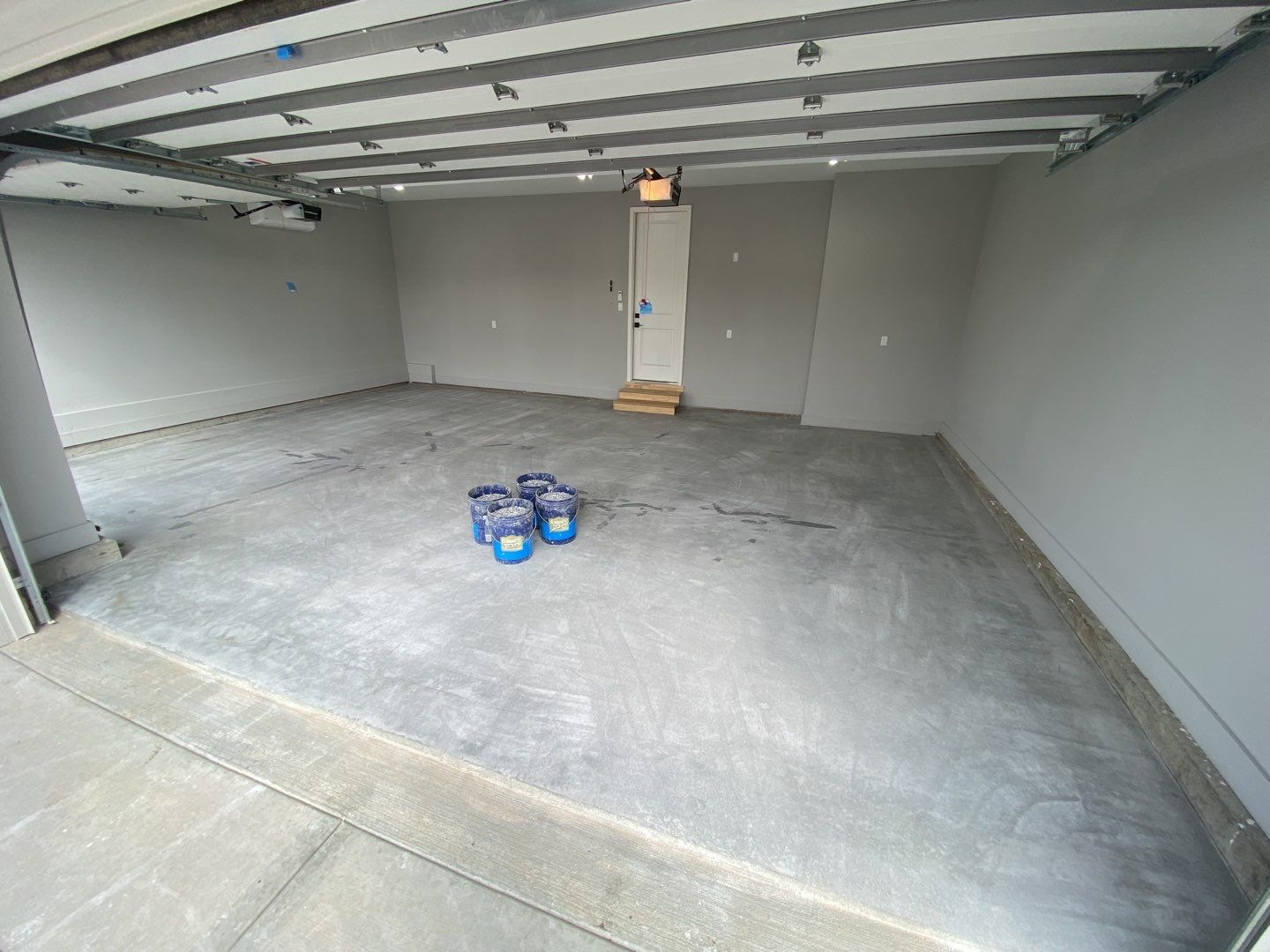Basement using Chestnut / Garage using Domino by Select Painting, Coatings & Garage Cabinets