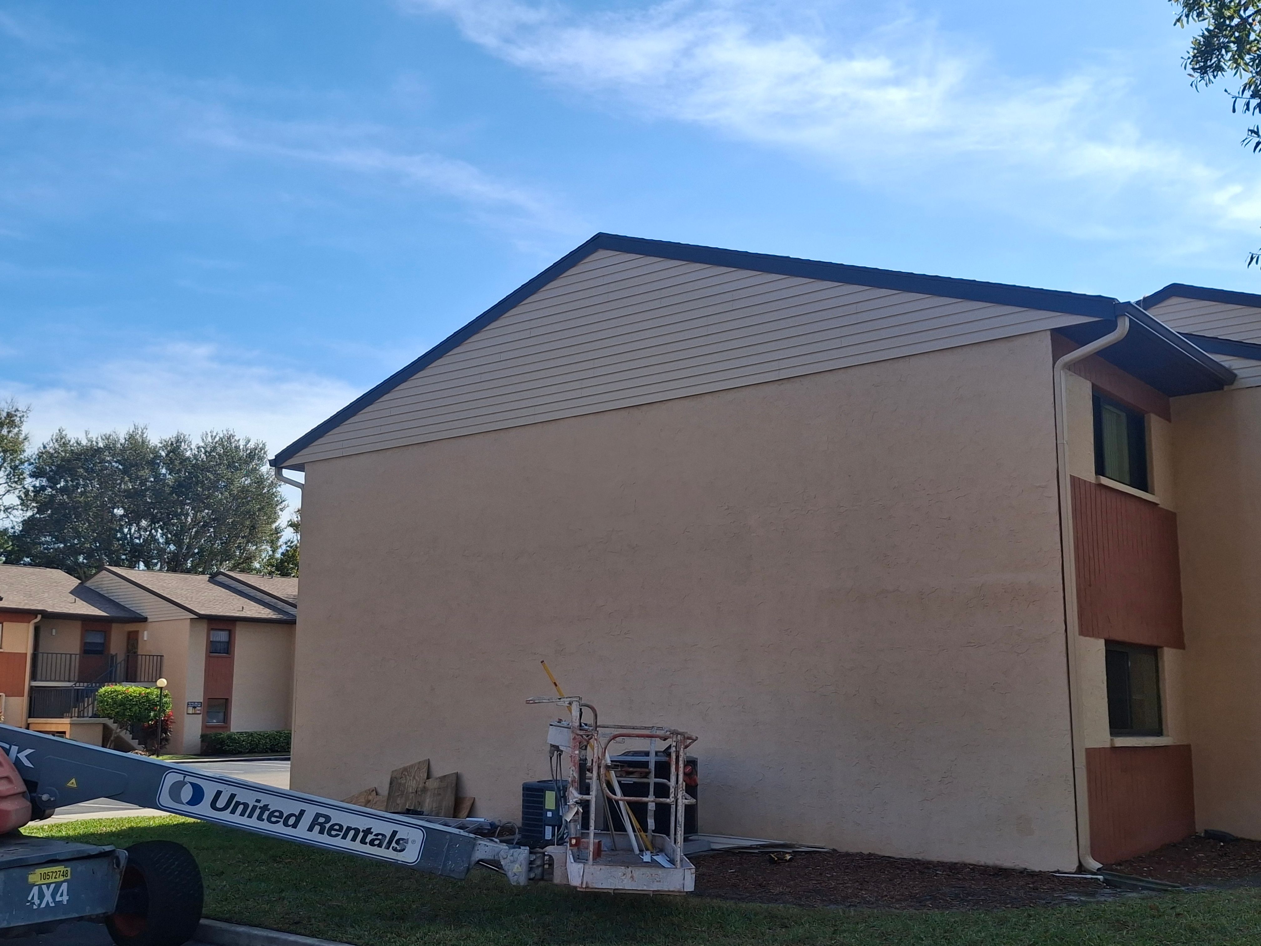 Multi-Family Roof Replacement and Siding Installation in Melbourne by Florida Roofing and Renovations Inc.