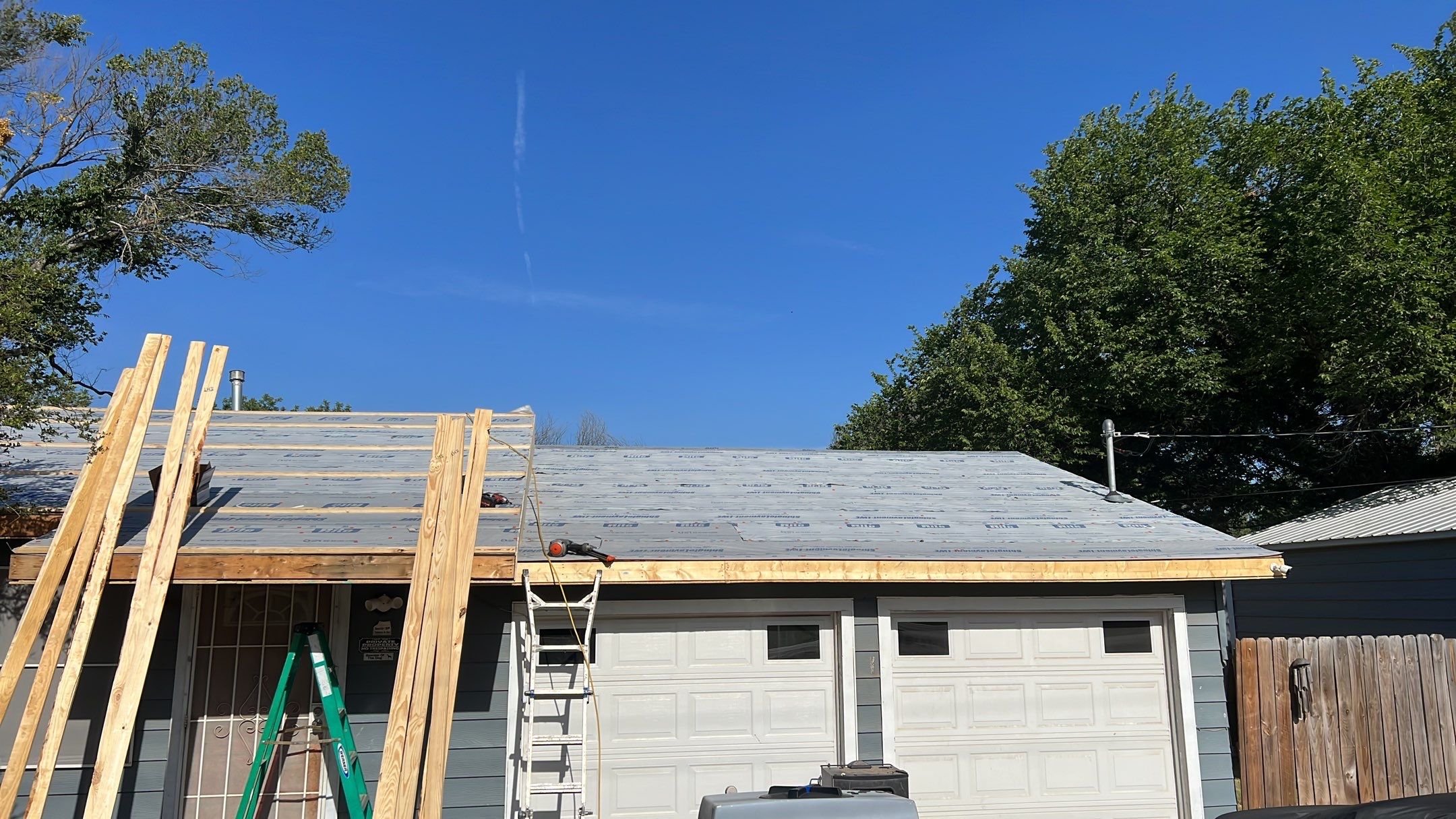 Residential Roofing Installation using PBR Metal Roof by Harvey Roofing & Construction