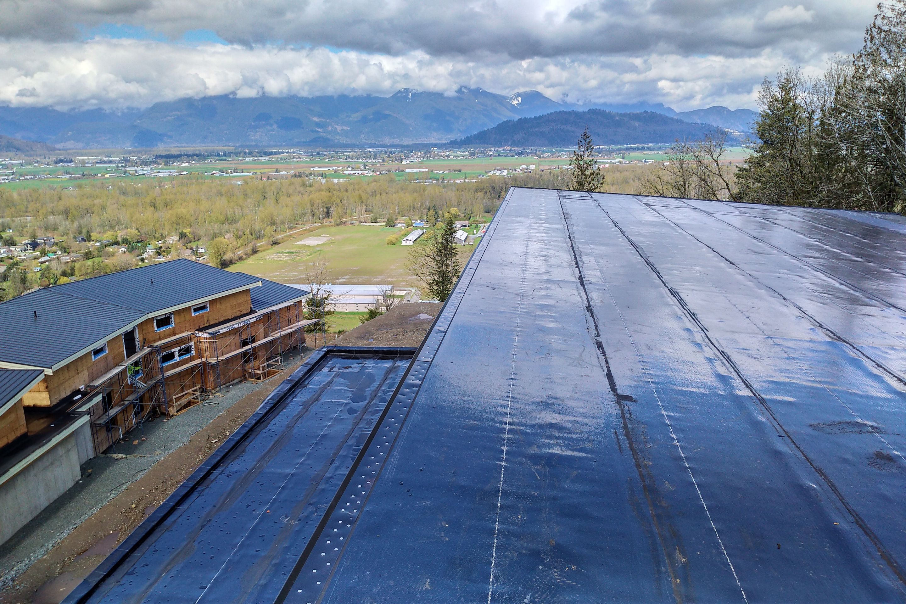 Residential Roofing Installation using IKO 2ply sbs  by Top Notch Roofing Inc