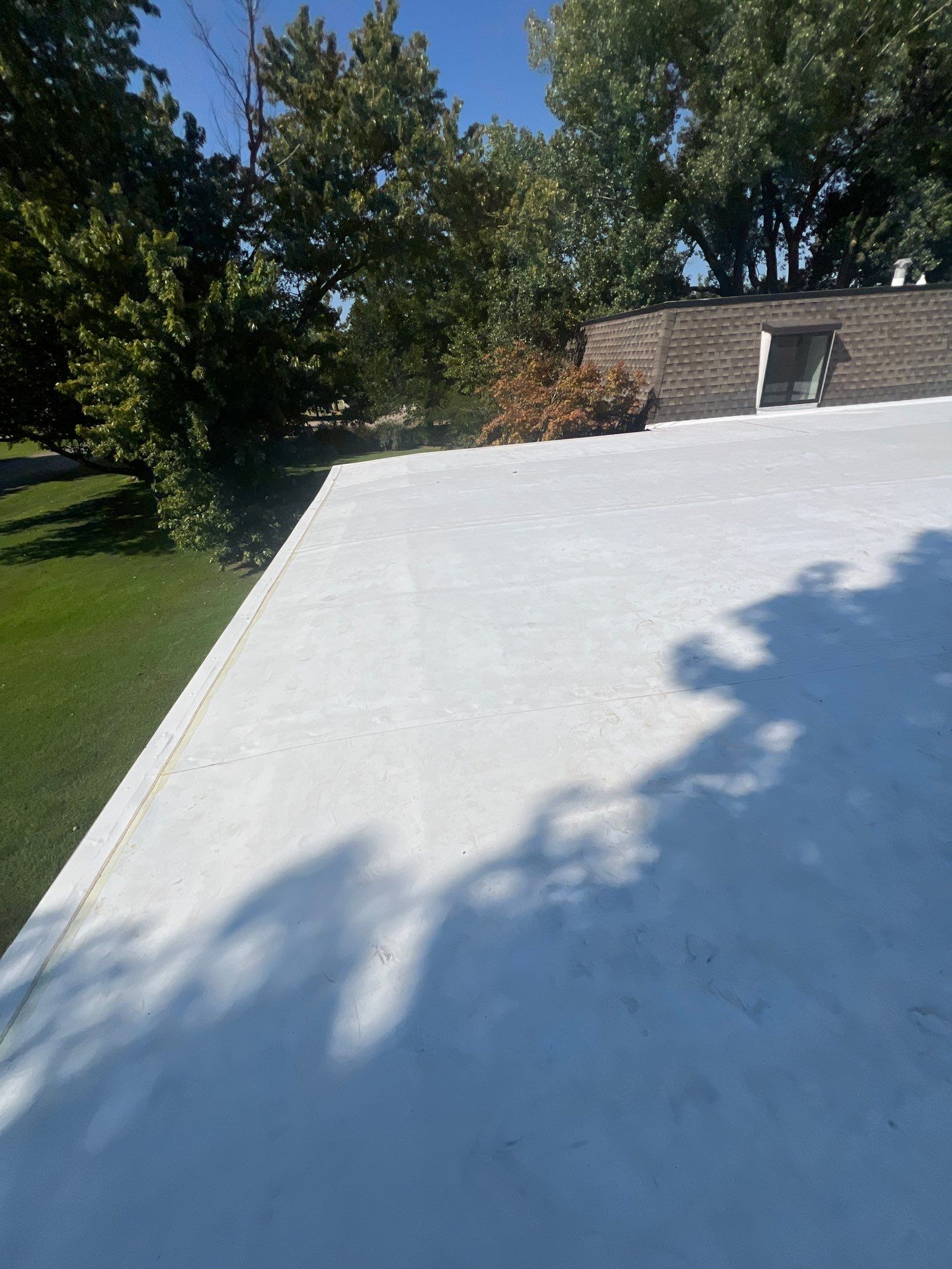 TPO Flat Roof Replacement in Edmond, OK by McCann's Roofing and Construction