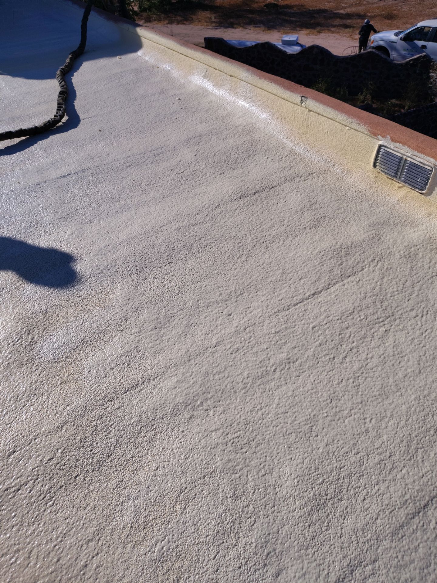 Residential roof application by SPF Services 