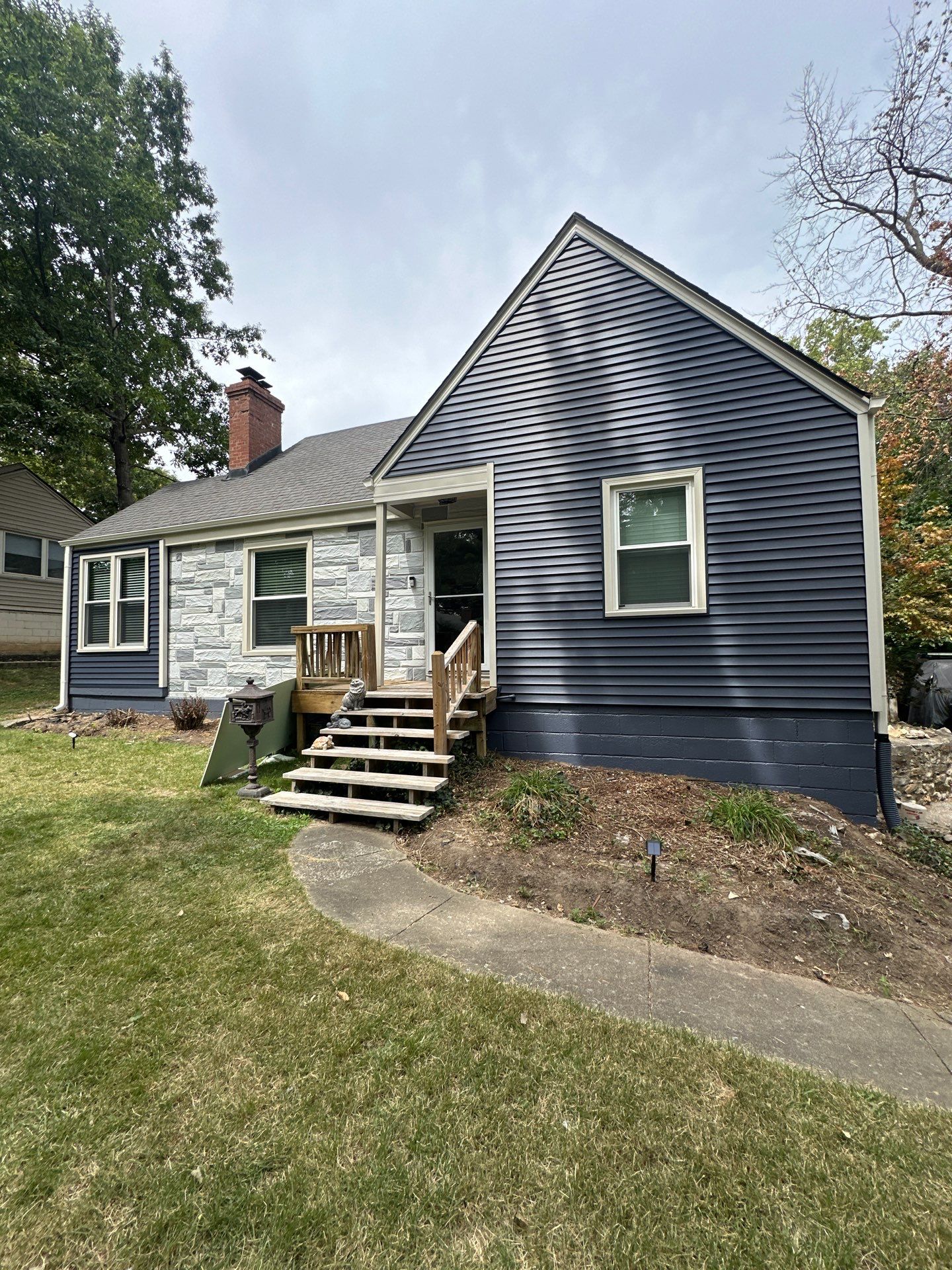 Kansas City Indigo Insulated Craneboard Siding and Window Replacement Project in Kansas City by EEC Windows, Siding & Roofing