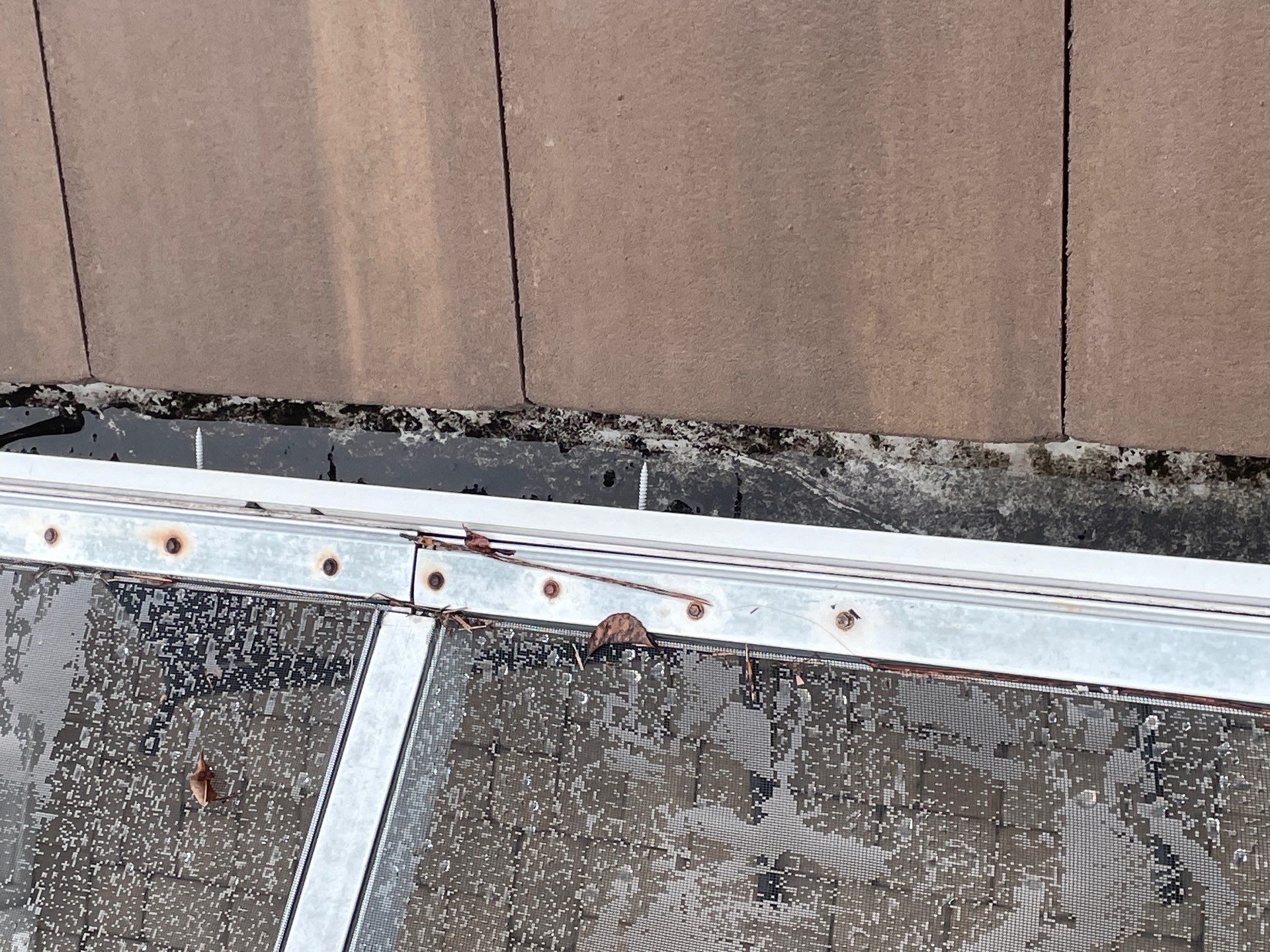 Gutter Cleaning using gutter cleaning in Sarasota FL by Gutter Professors