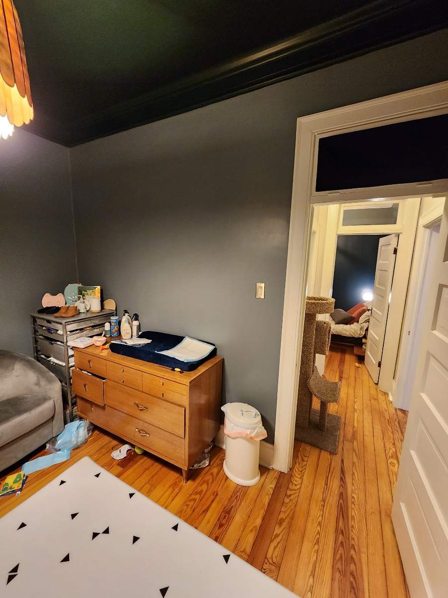 Denver Nursery Renovation Featuring Custom Shiplap and Floral Wallpaper by LP Construction Services