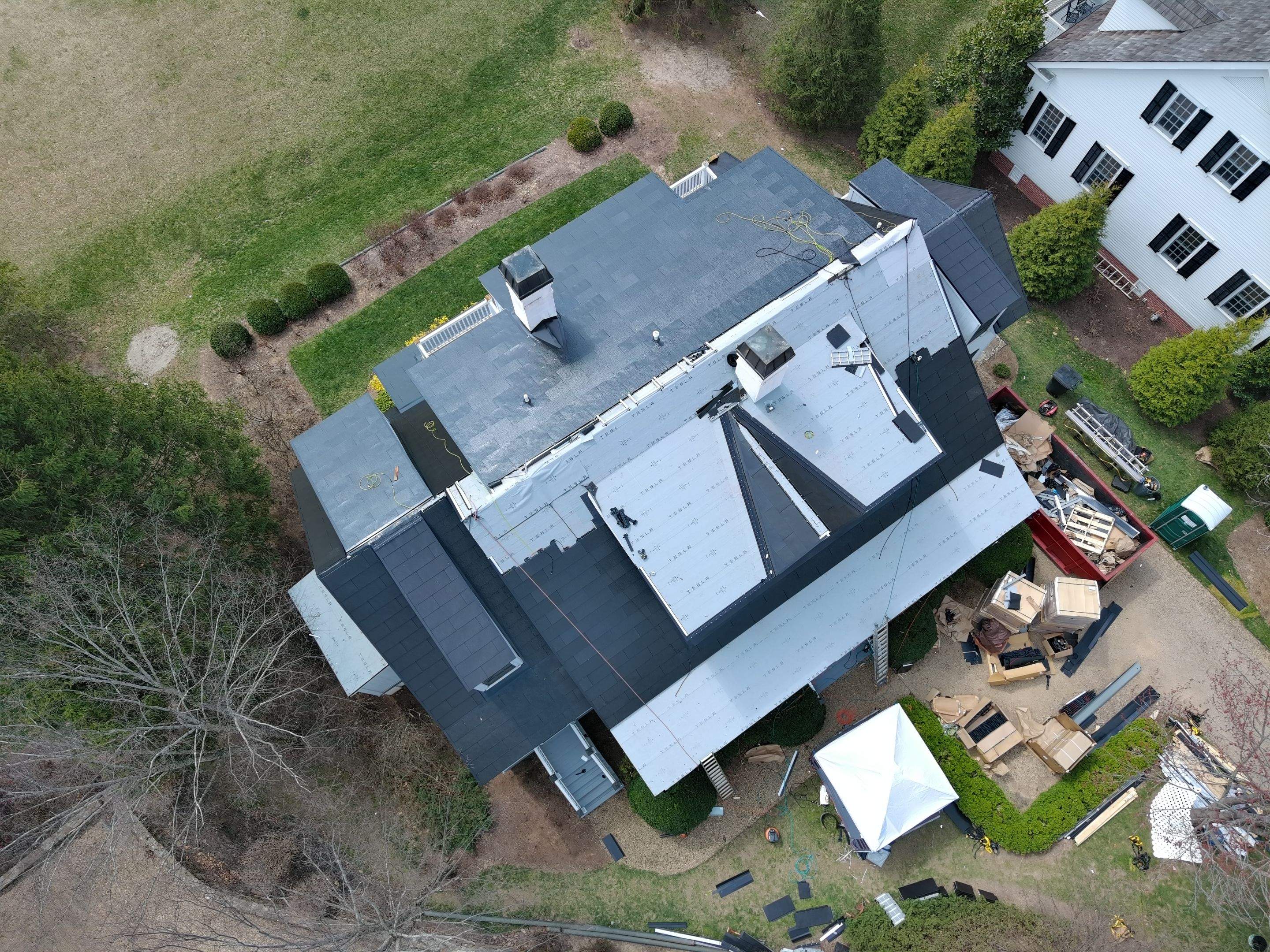 Tesla Solar Roof using Tesla Solar Roof by American Home Contractors