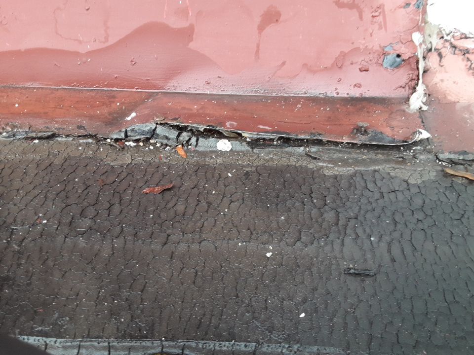 Residential Roof Replacement using Patio Roof by Absolute Roofing and Construction
