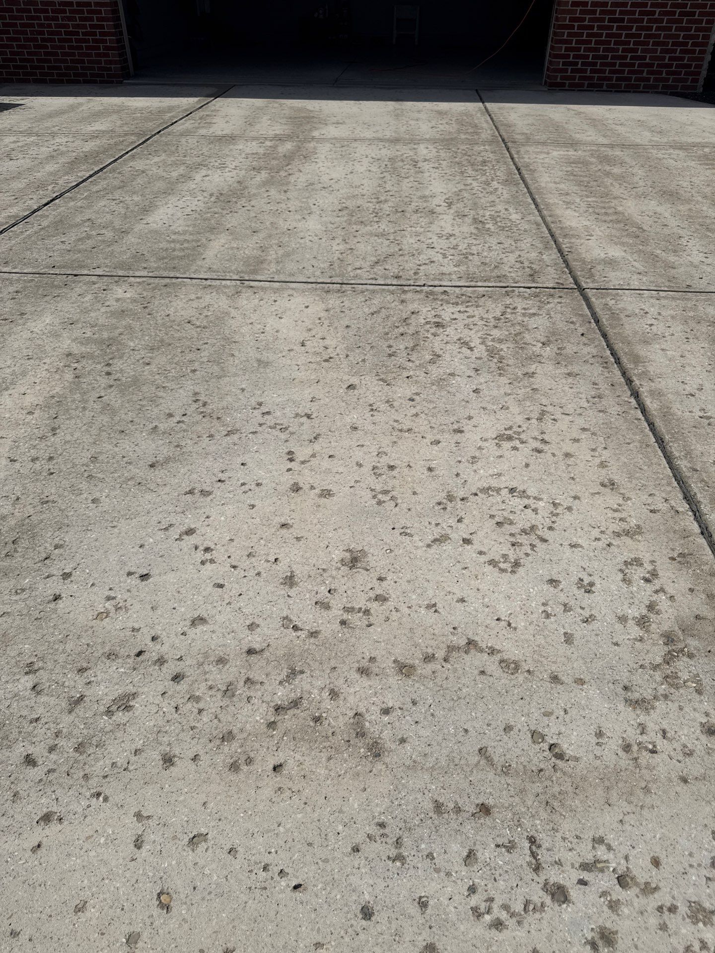 Driveway + Garage + Walkway Project in Meridian by Floors in a Day, Inc