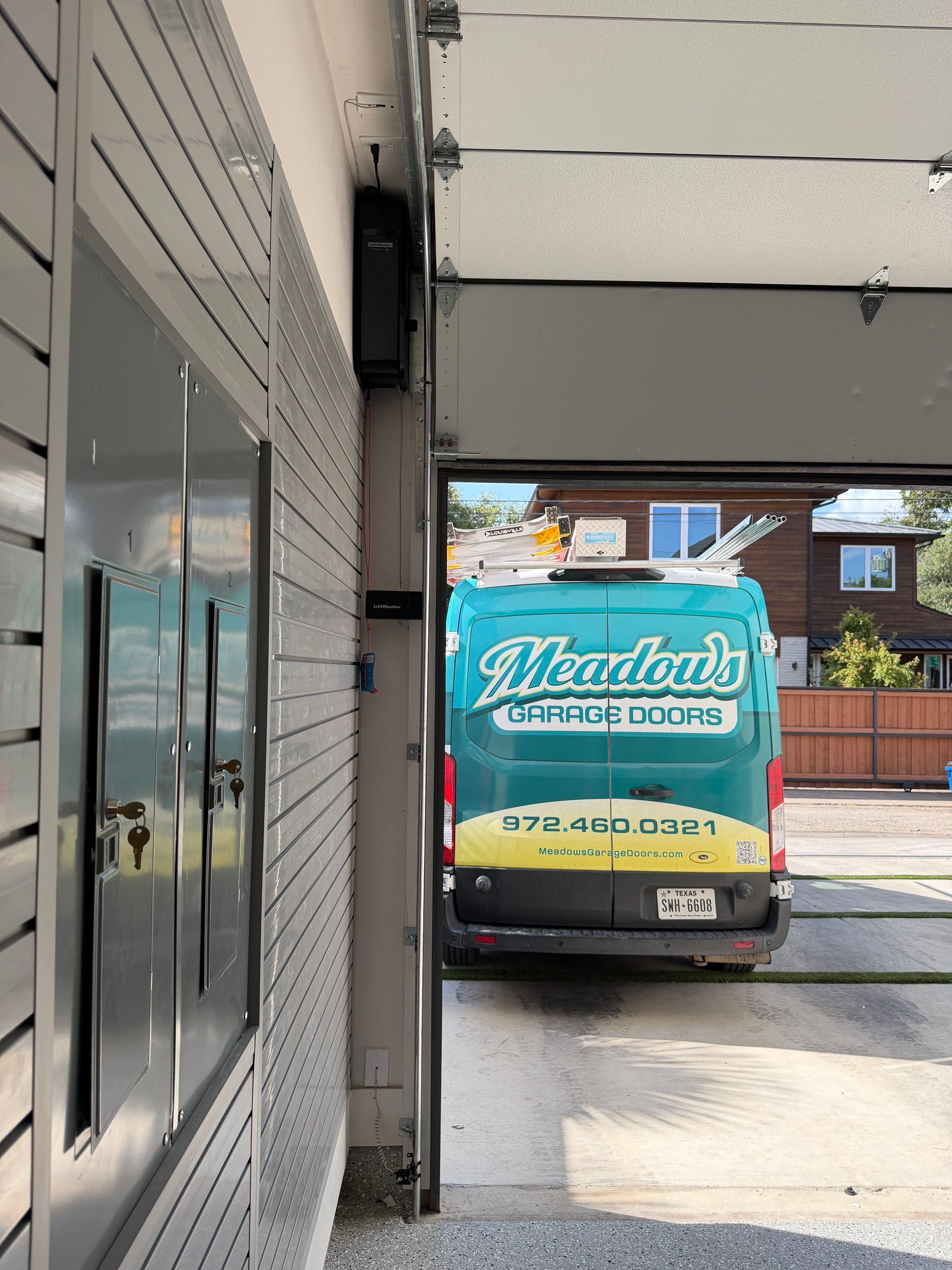 High-Lift Garage Door Conversion and LiftMaster Opener Installation in Dallas by Meadows Garage Doors
