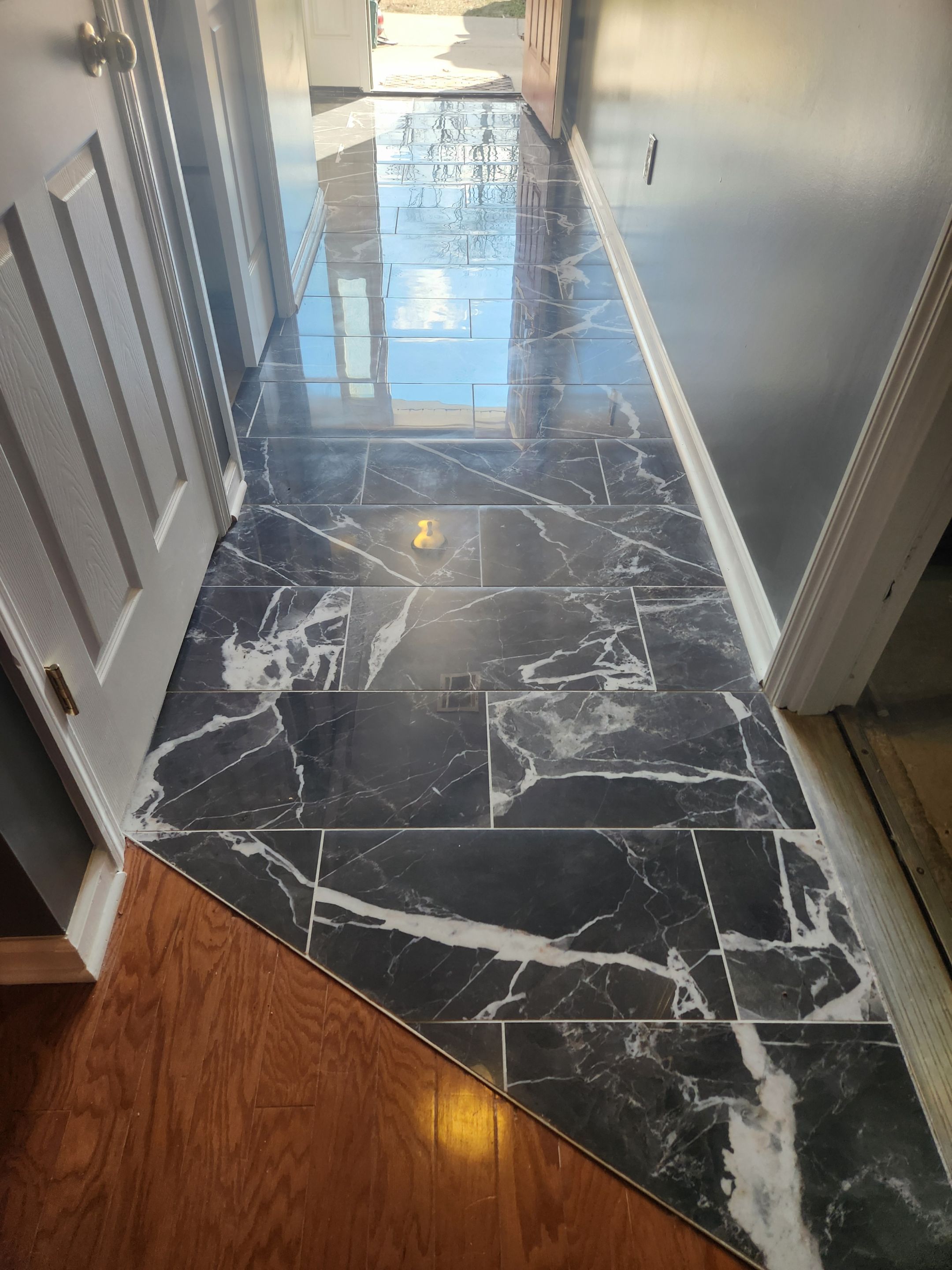 Porceline Tile Floor install using Porceline Tile by Footprints Floors Morristown