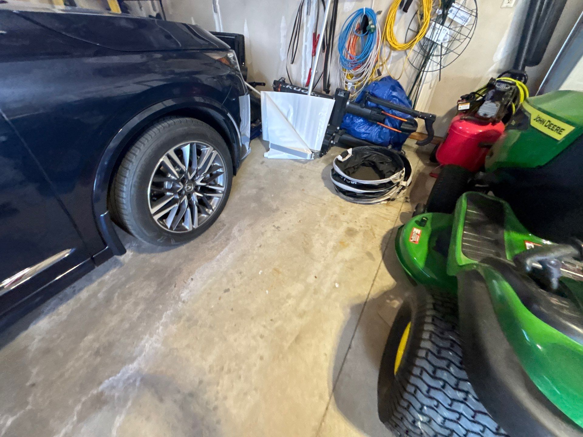 Sioux Falls Garage Concrete Repair and Epoxy Flake Floor Coating by Select Painting, Coatings & Garage Cabinets