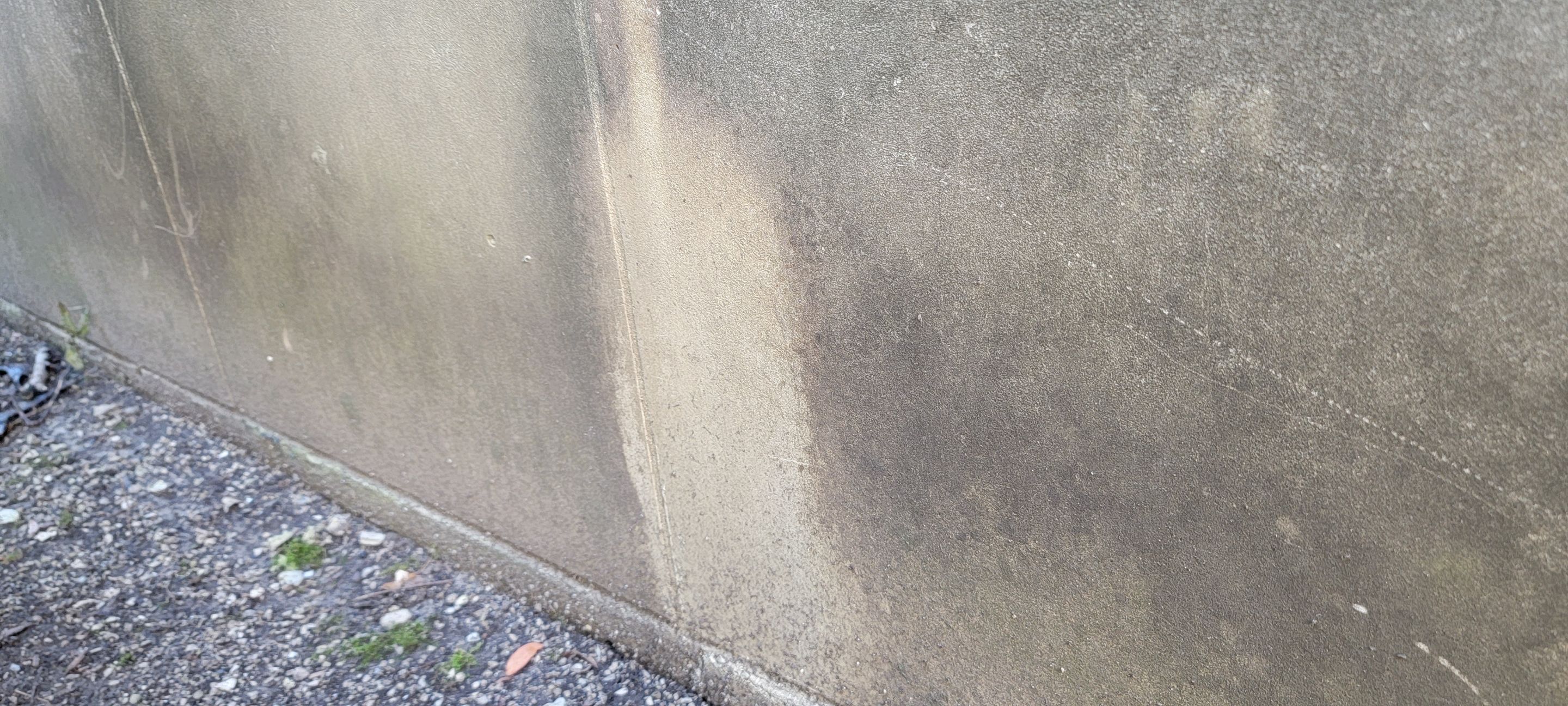 Courtyard pressure washing difficult access. by Northern Power Washing LLC.