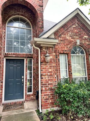 IKO Cornerstone-Dark Reddish Brown brick house 