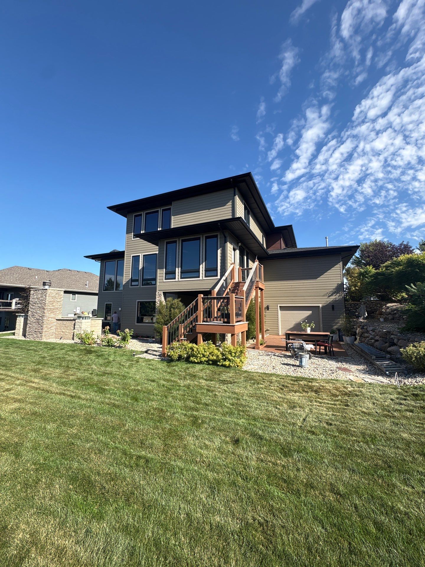Exterior Painting and Siding Refresh for Multi-Level Tea Residence by Select Painting, Coatings & Garage Cabinets