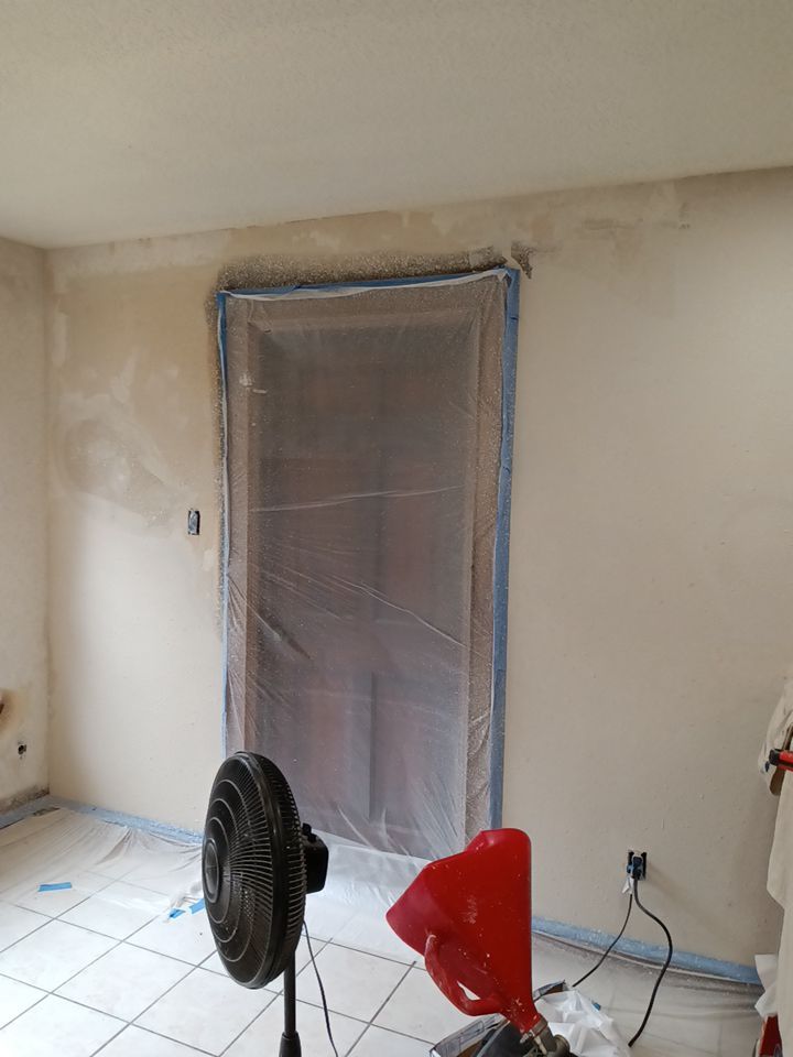 Interior and exterior painting project by Roof Concepts Construction