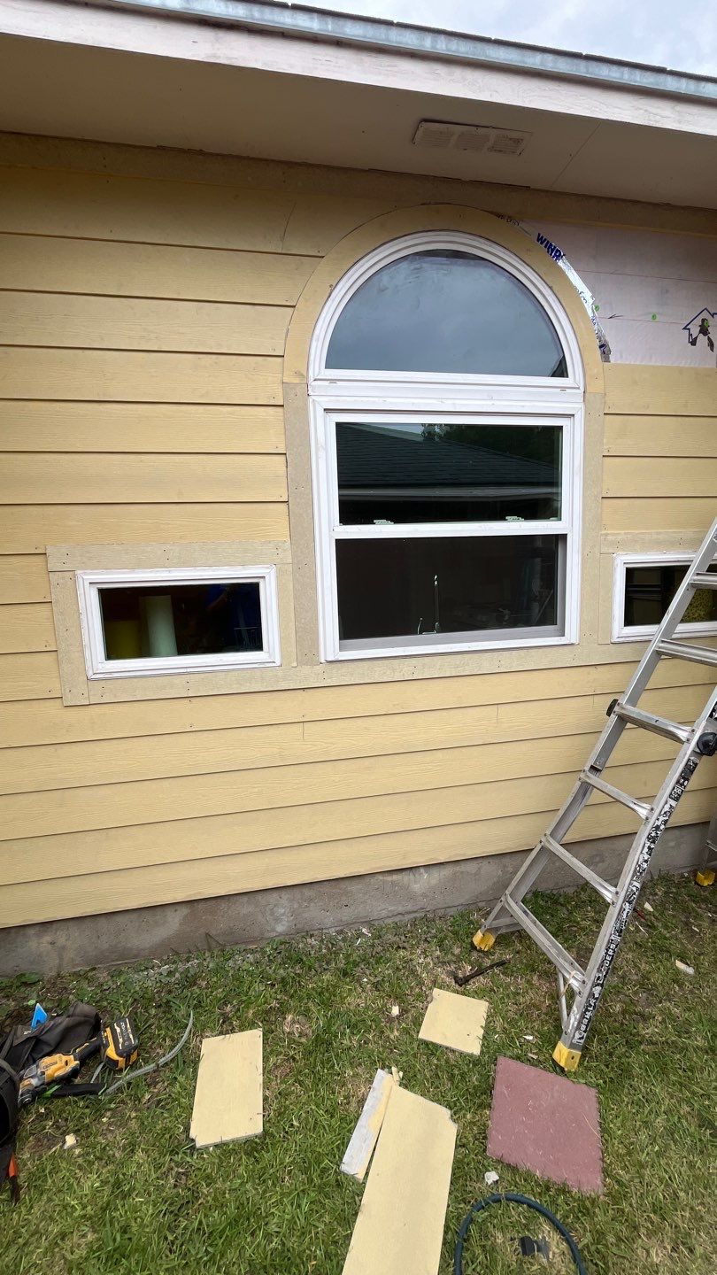 Windows with a side of Siding  by Bayfront Roofing and Construction