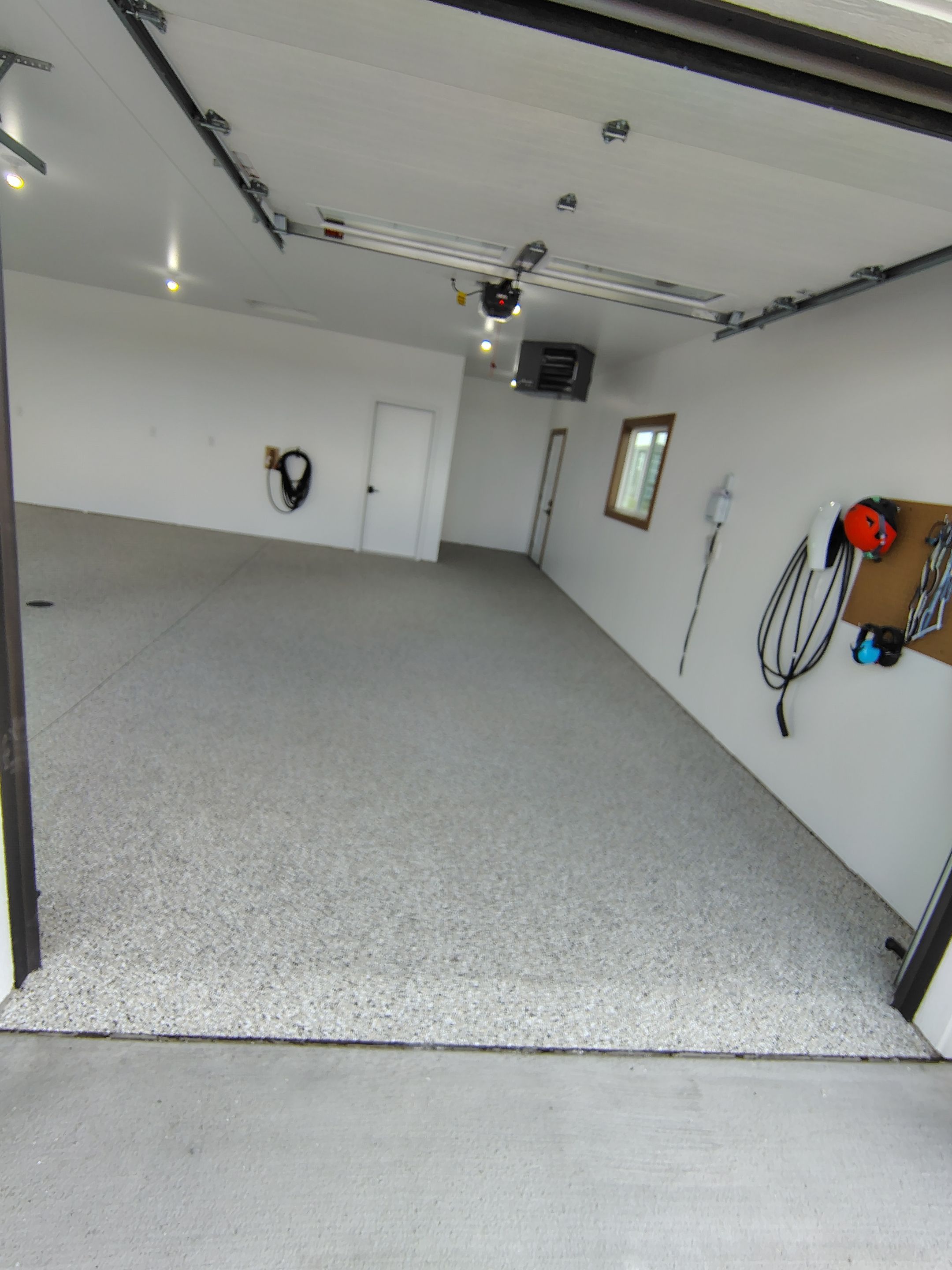 Gray and White Speckled Epoxy Garage Floor Coating in Tea by Select Painting, Coatings & Garage Cabinets