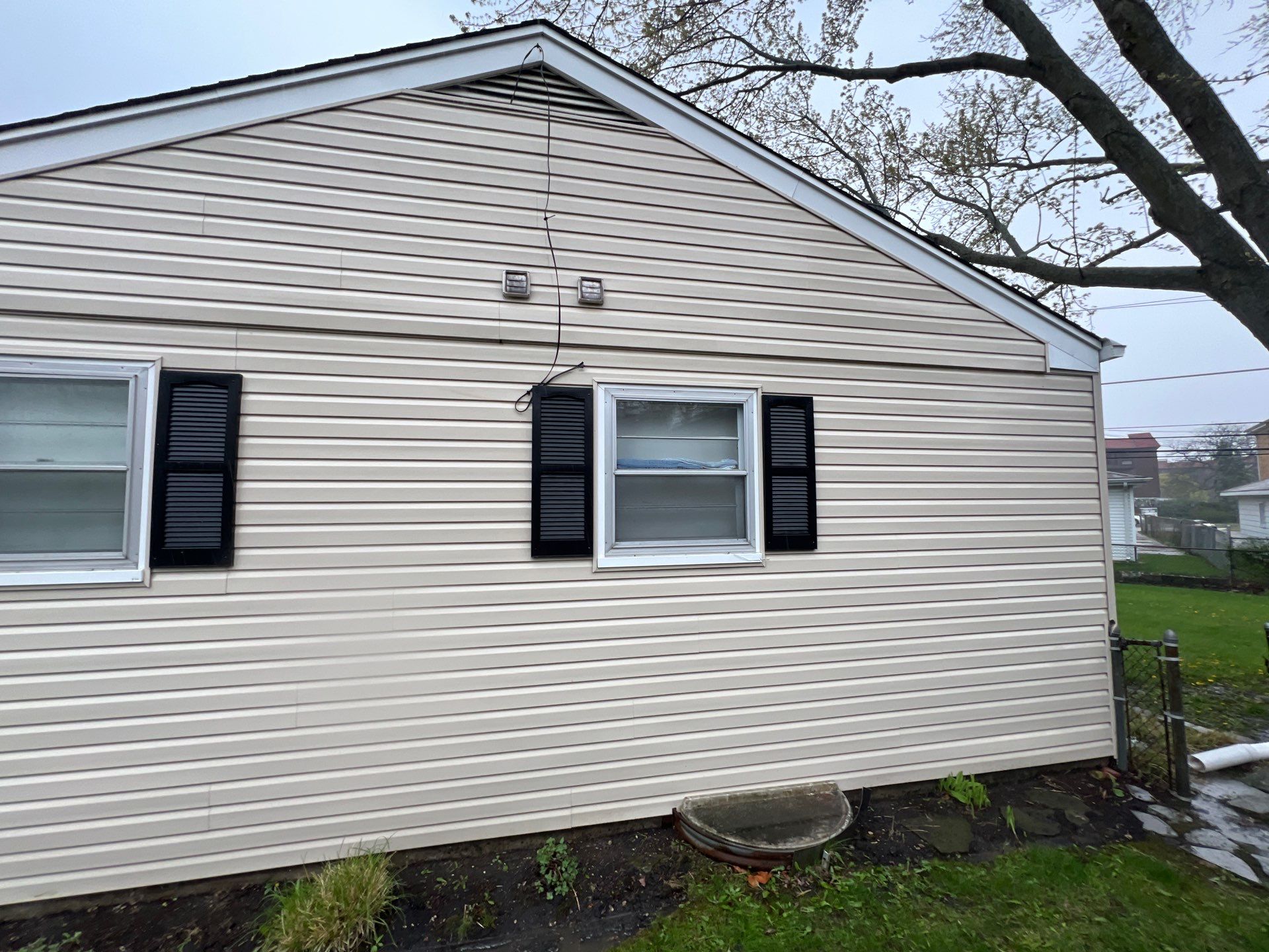 Housewashing  using Algaecide, soft wash soap by Northern Power Washing LLC.