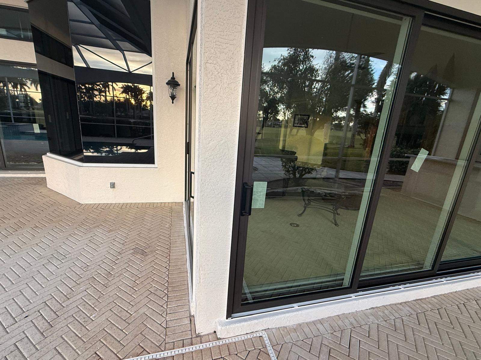 Window Installation using PGT Vinyl White-Bronze by Windows For Life 