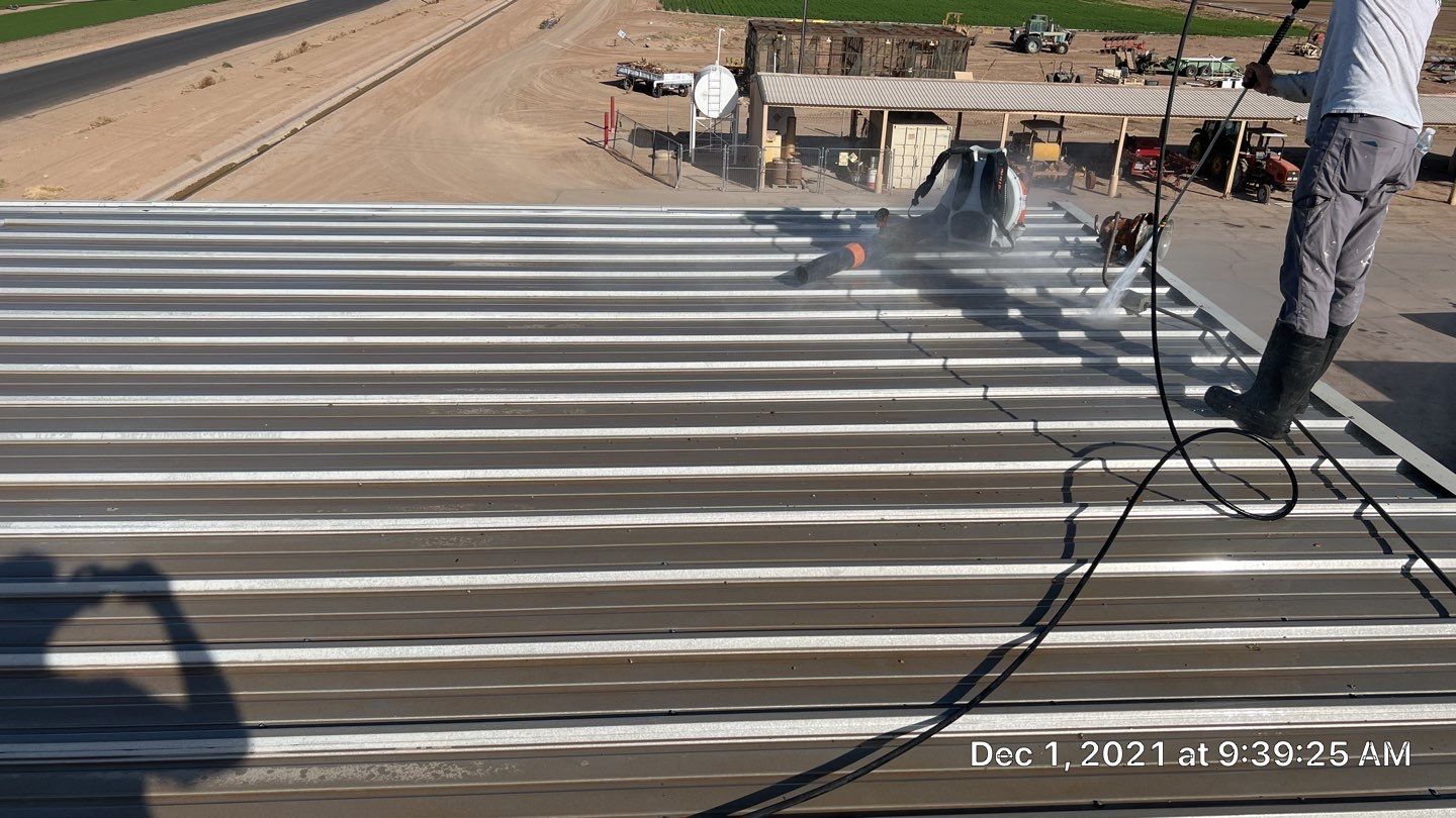 Metal roof restoration on commercial roof using Conklin Benchmark/PUMA XL fabric and coating by Straight Edge Roofing Inc