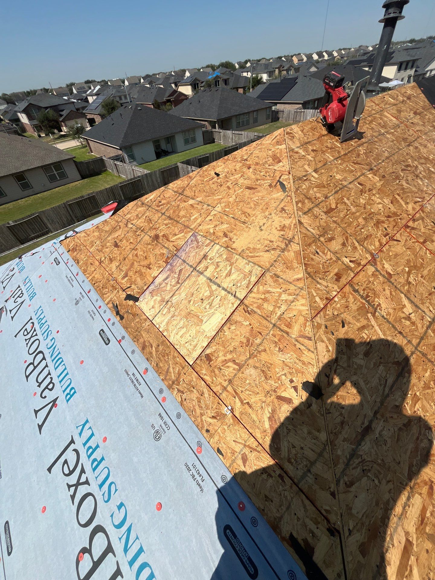 Reroof with Solar panel Detach and Reset by Berry Good Roofing 