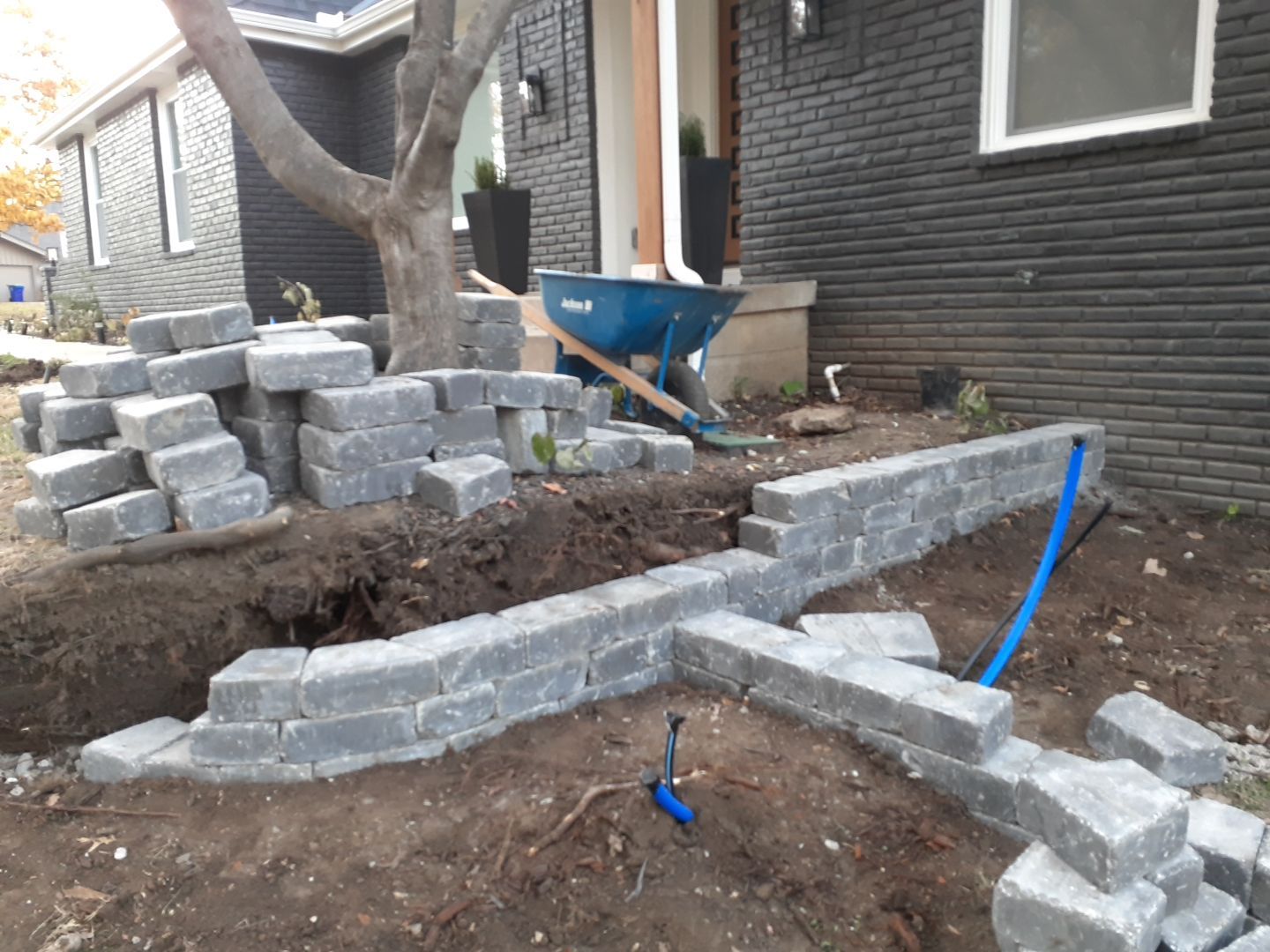 Entire Home Landscape and Retaining Walls by LAND ESCAPES LLC