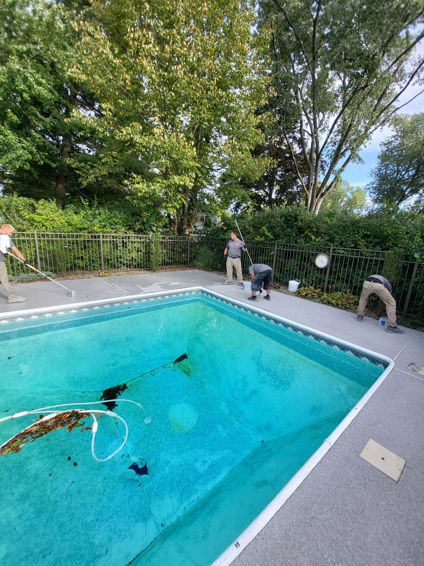 Blue Granite Pool Patio Concrete Coating in Lincoln Park by Spectrum Painting, LLC