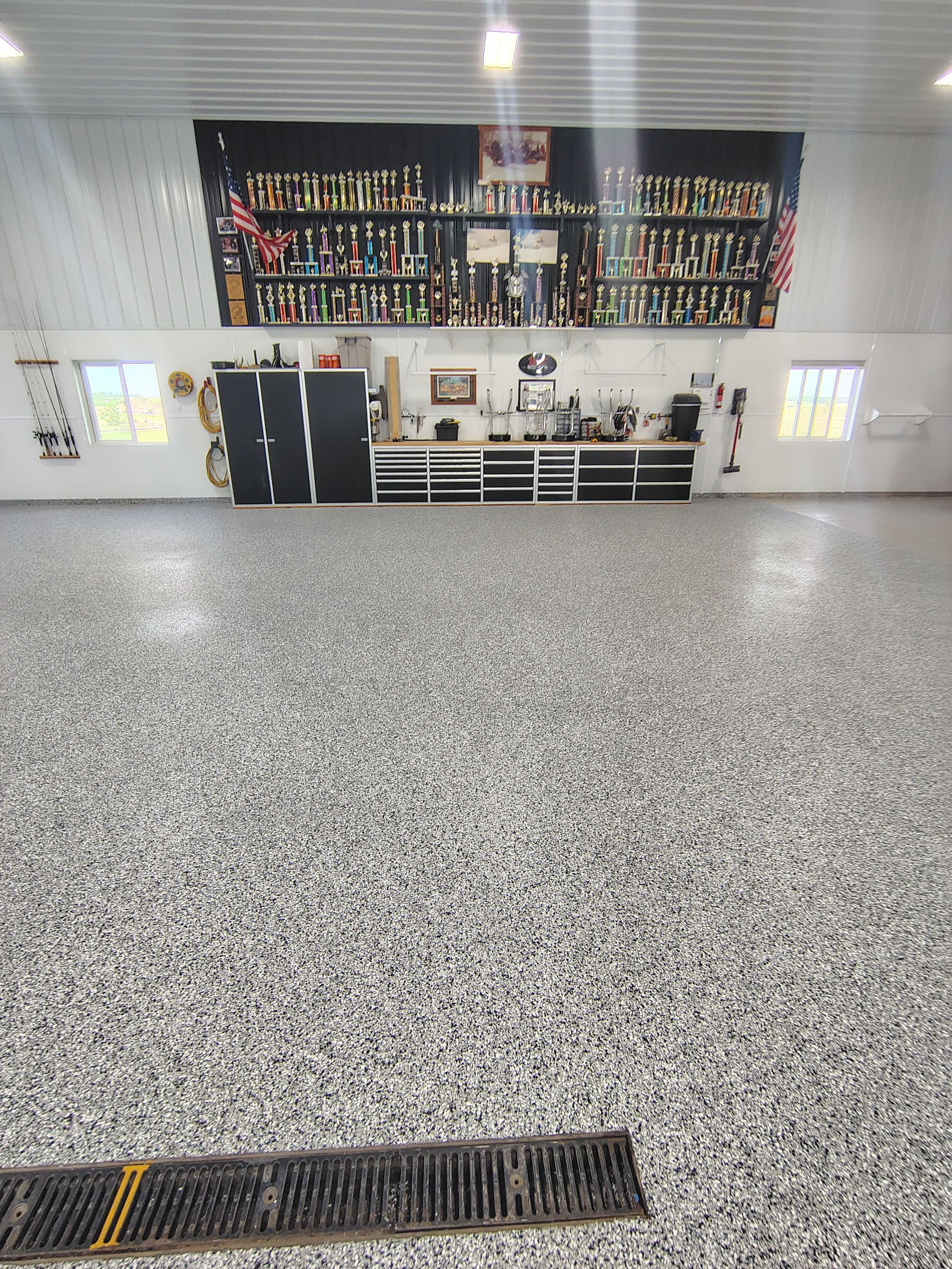 Multi-Stage Concrete Floor Coating for Egan Shop and RV Storage by Select Painting, Coatings & Garage Cabinets