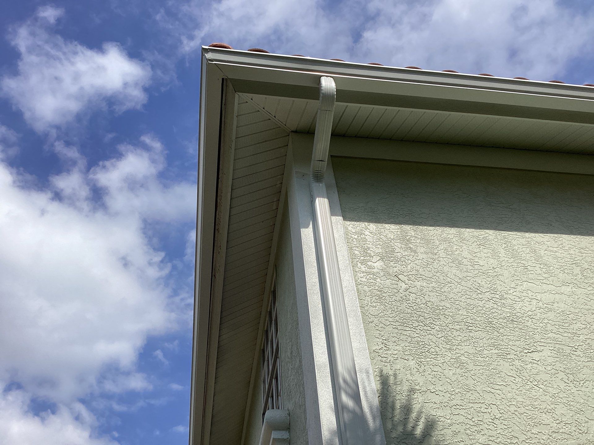 Downspout and Elbow Installation in Bonita Springs FL by Gutter Professors