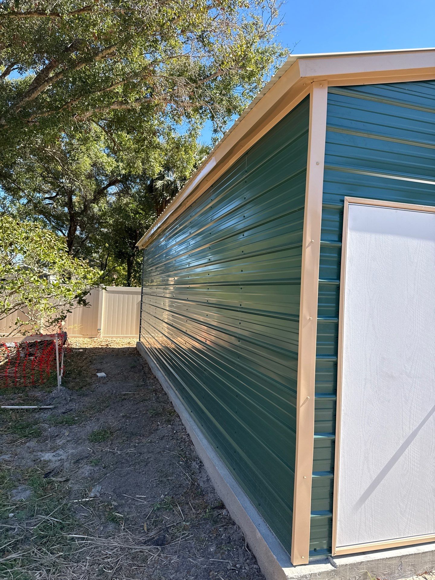 White 6-inch K-style Gutters and Down Spouts using Seamless Gutters White Down Spouts in Tampa FL by Gutter Professors