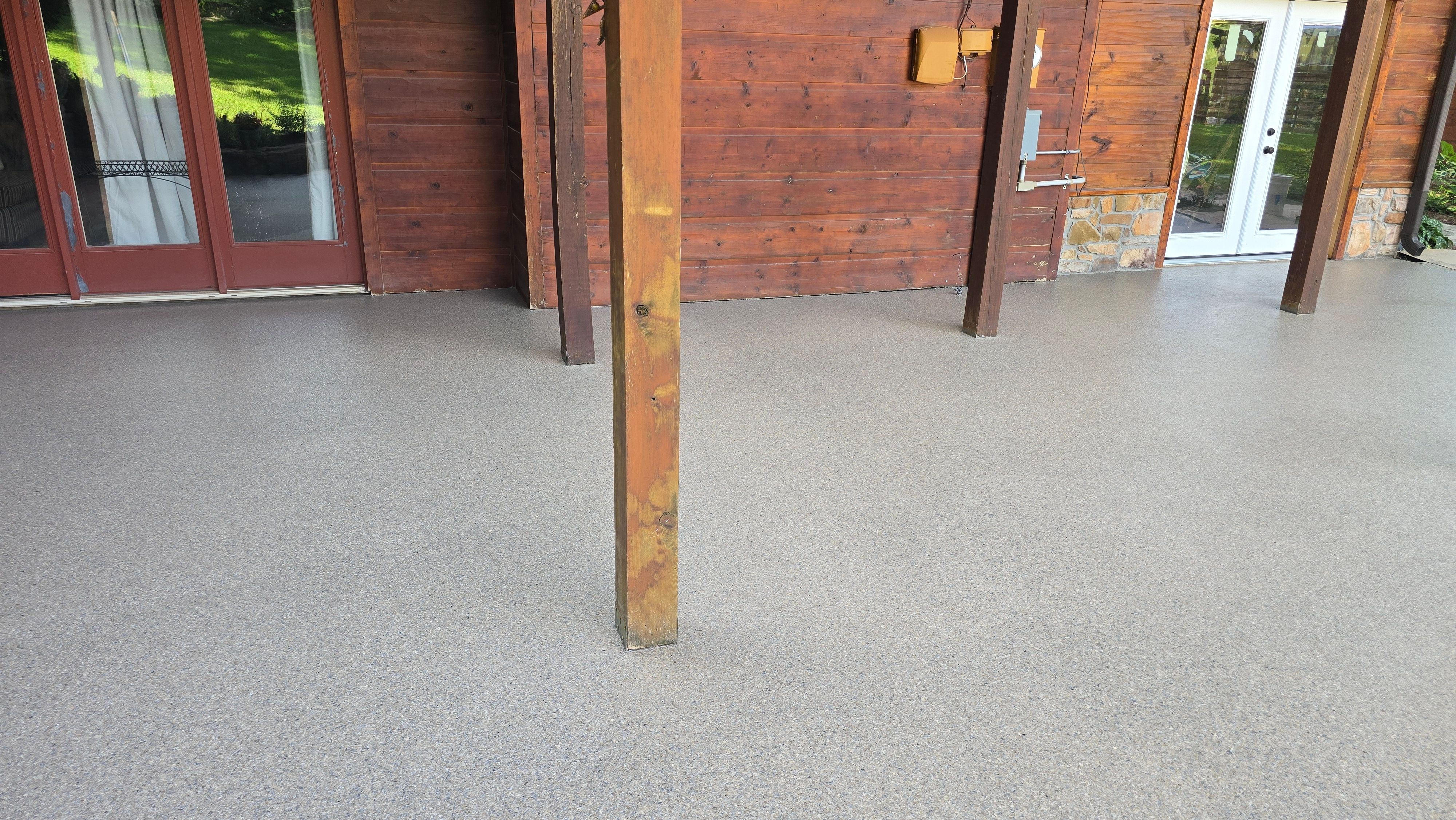 Back Patio using Obsidian by Elite Floor Solutions