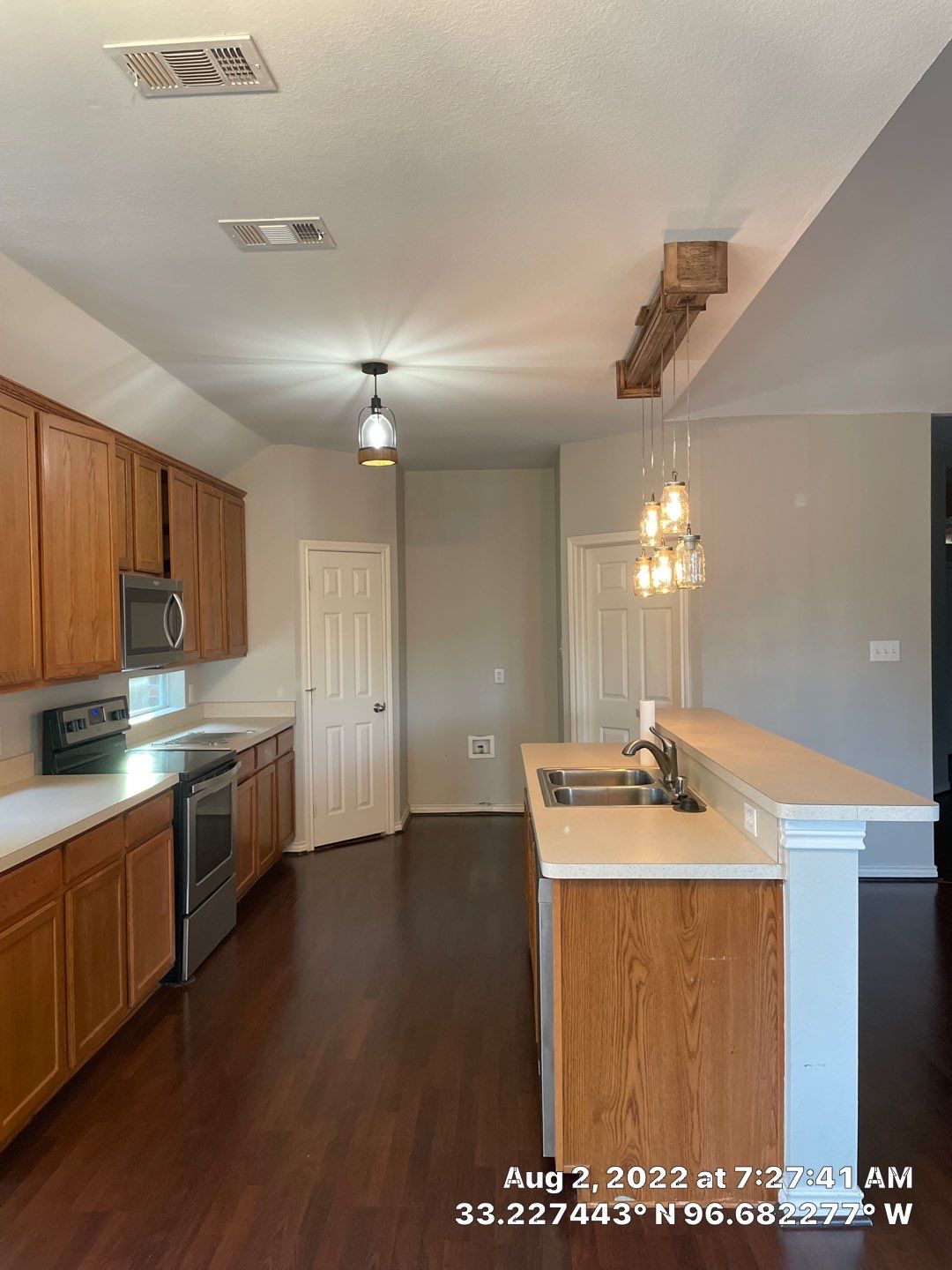Custom cabinetry Kitchen Remodel by SLM General Contractors & Roofing