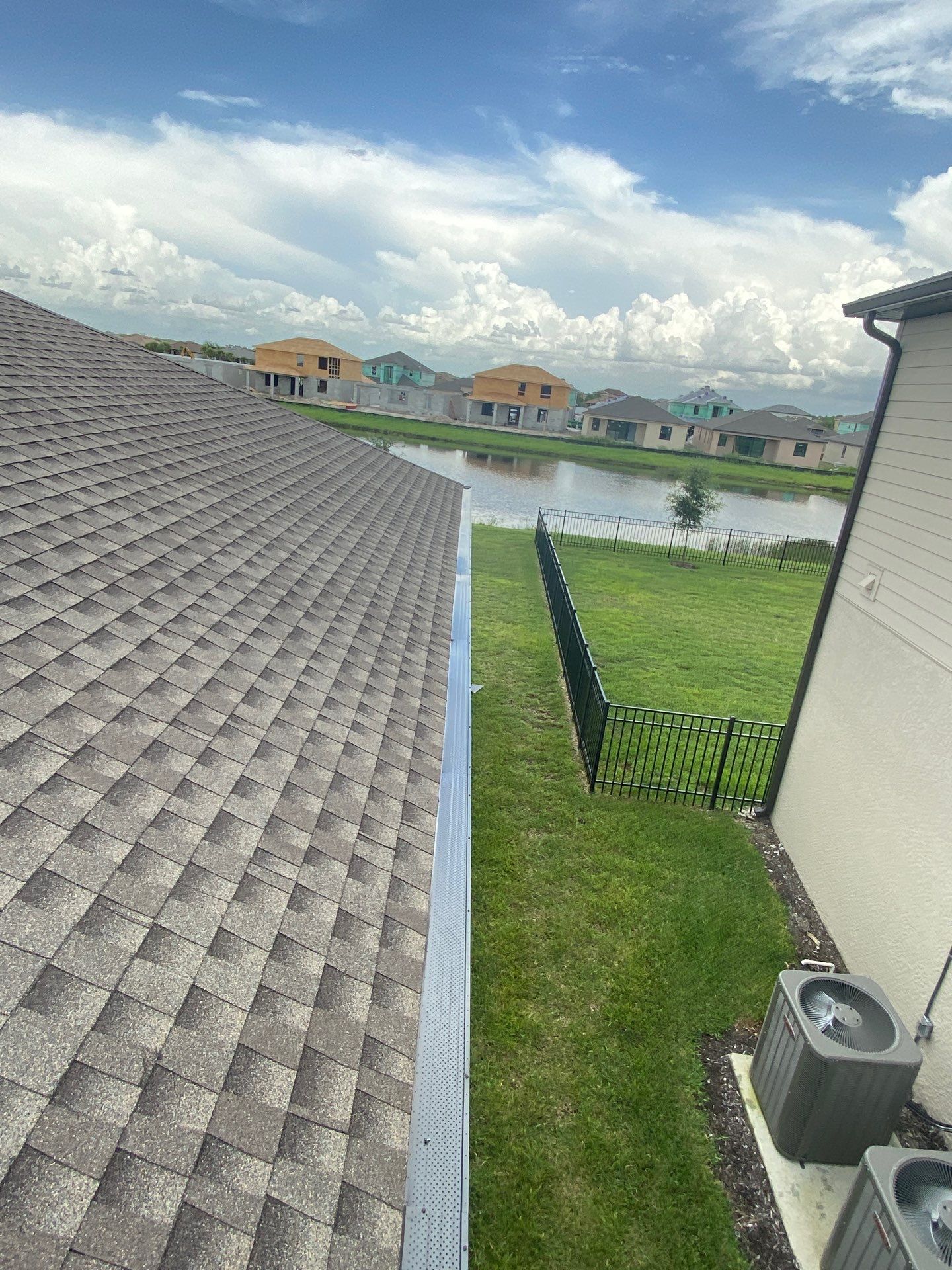 Brown Seamless Gutters for Homes in Fort Myers by Gutter Professors