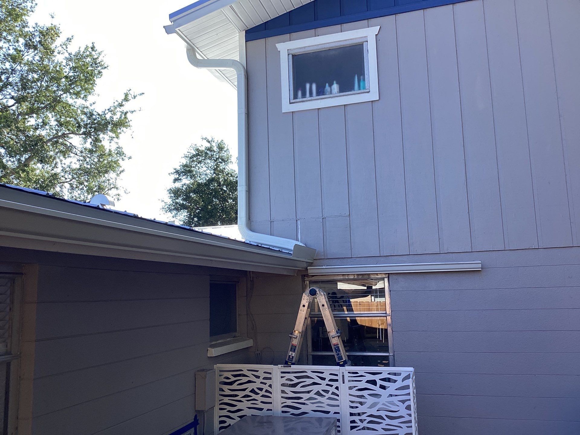 White K Style Seamless Gutters using 3X4 Elbow Downspout in Sarasota FL by Gutter Professors