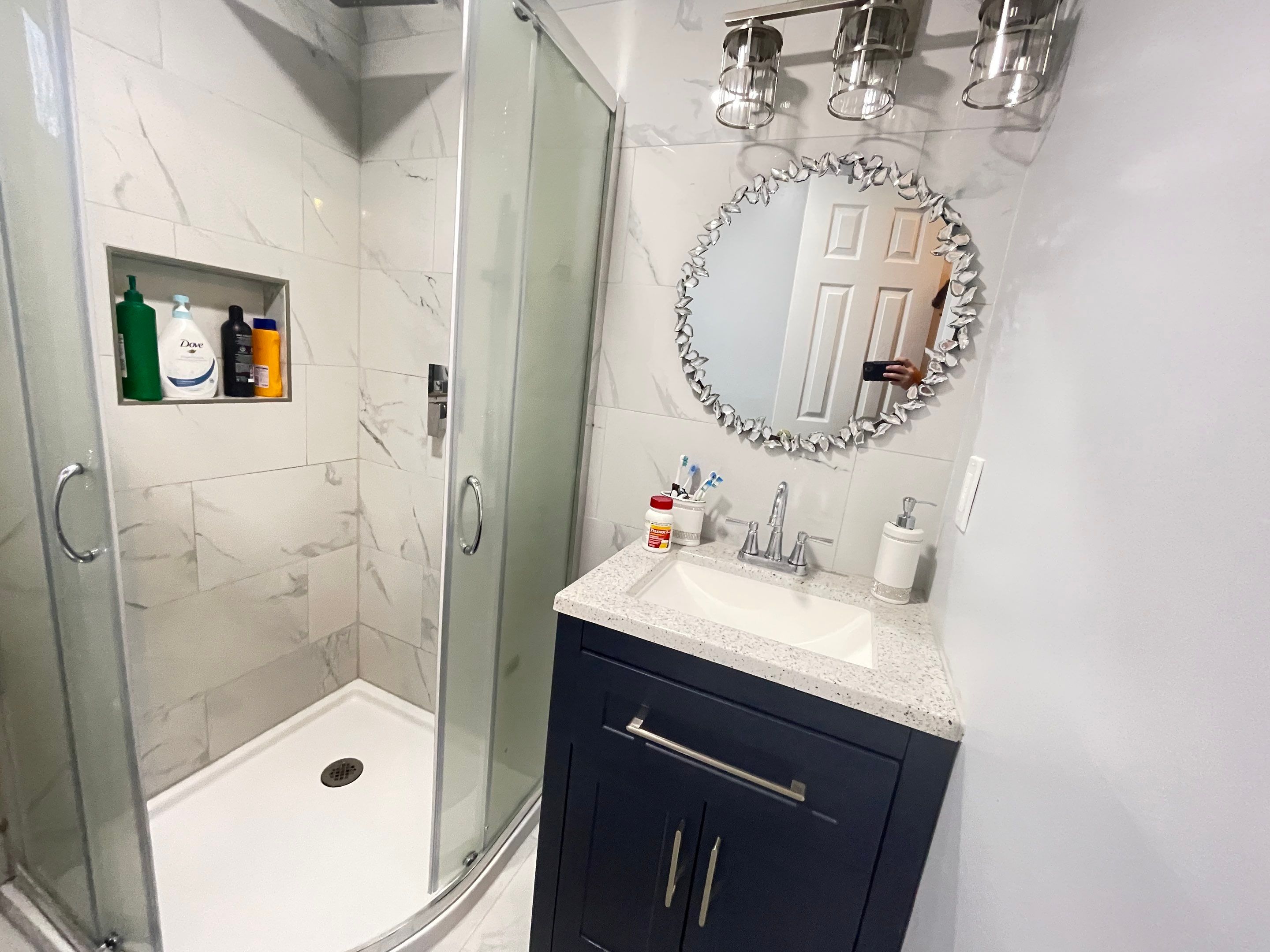 Bathroom Remodel using Tile by Home Concepts Construction