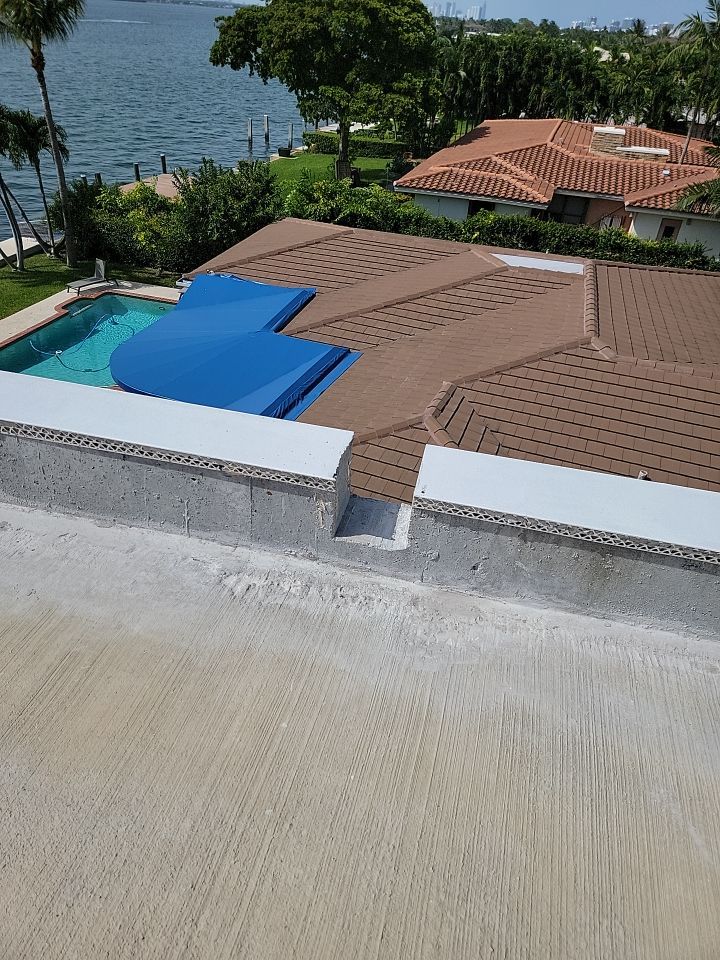Flat Roof White Membrane and Insulation Installation in Miami Beach by AJF ROOFING INC