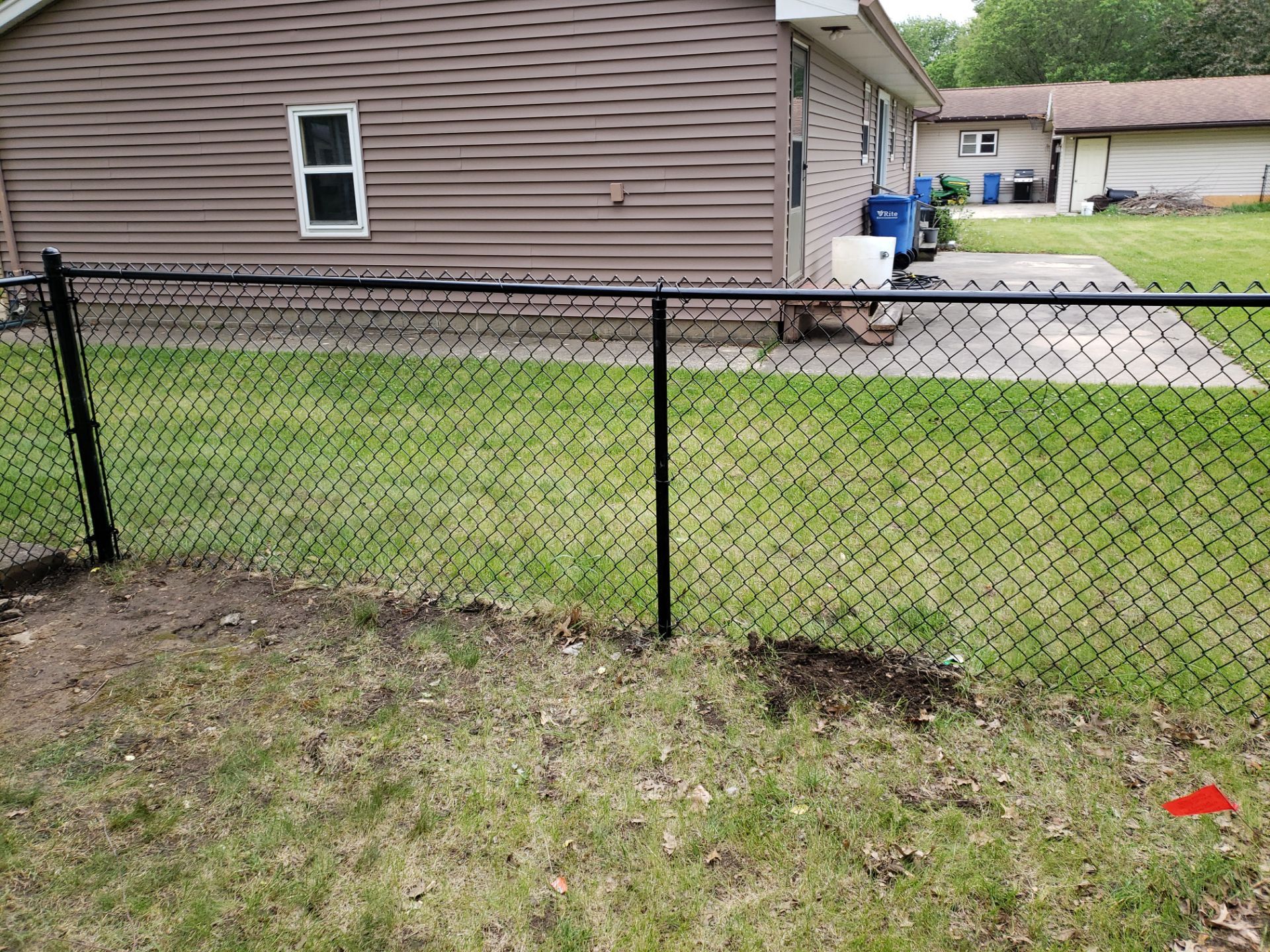 Chain Link and Cedar Privacy in Grundy Center by Perfect Picket Fence and Stain
