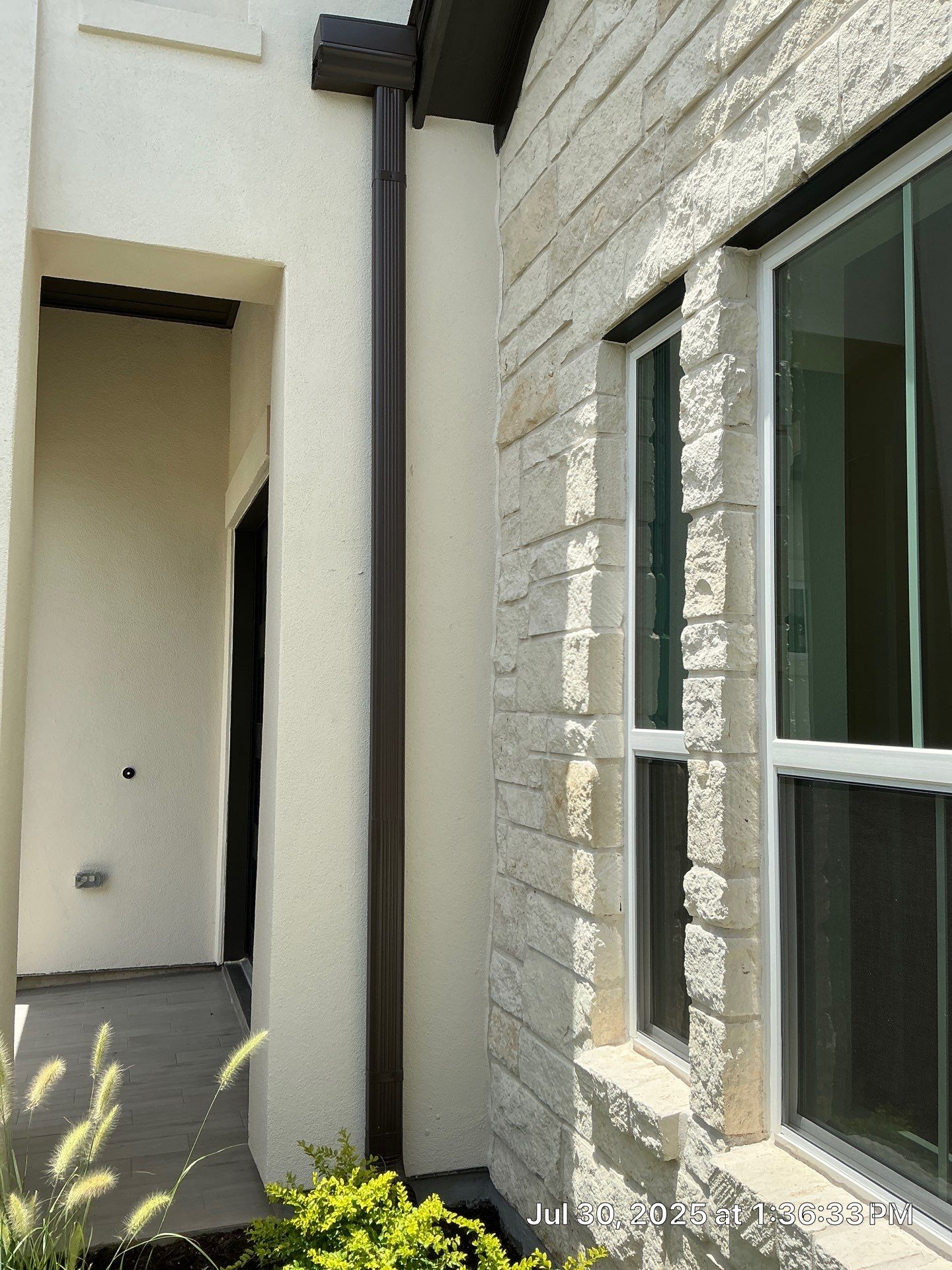 Magnolia Craftsmanship: Stucco and Foam Accents with Stone Integration by Apex Conventional Stucco Llc