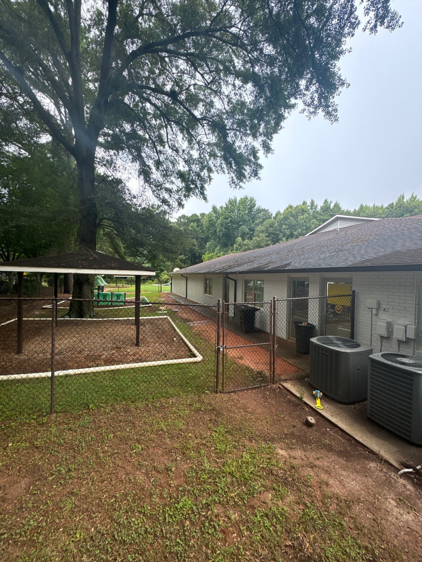 Commercial Exterior Brick and Stucco Painting in Fayetteville by Swift Home Renovations